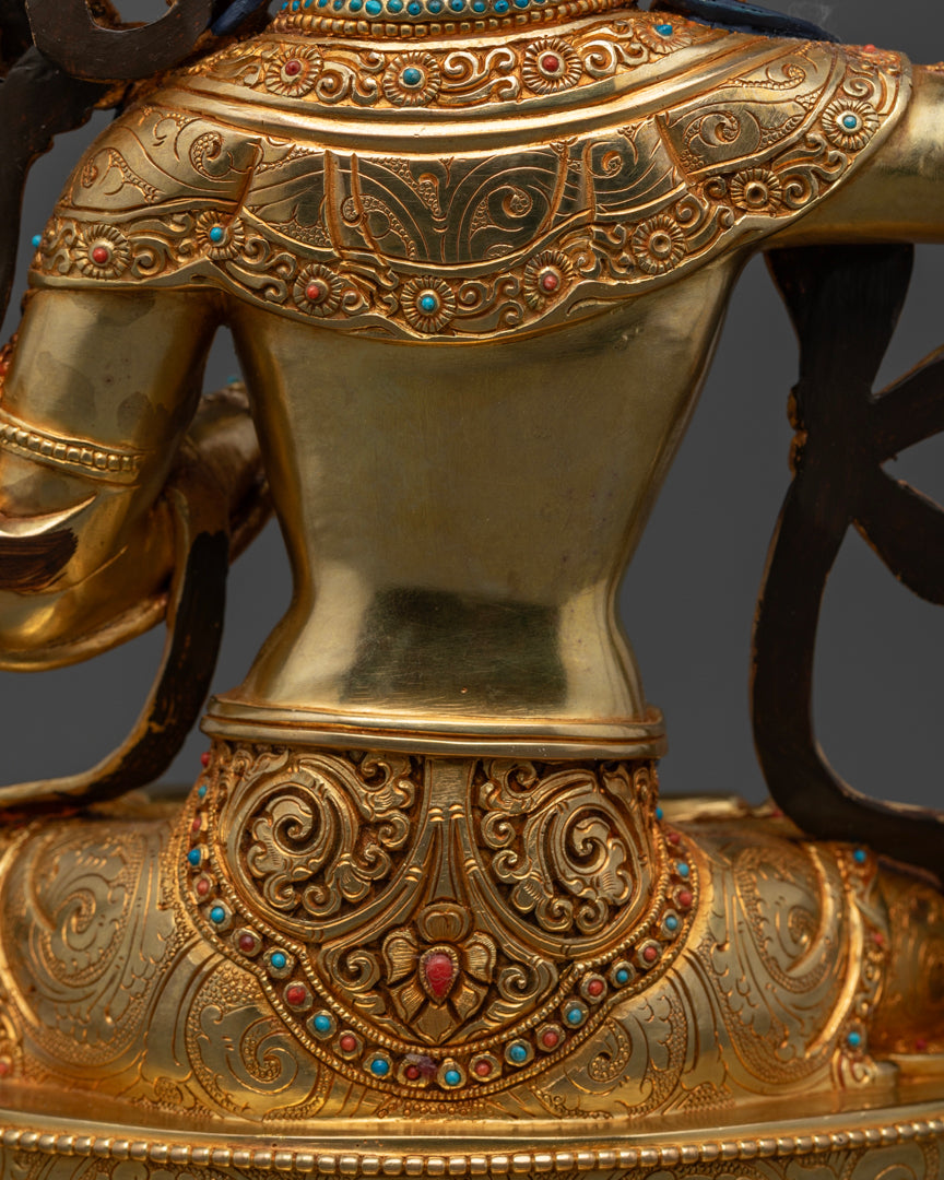 the back part of gold plated Manjushree statue