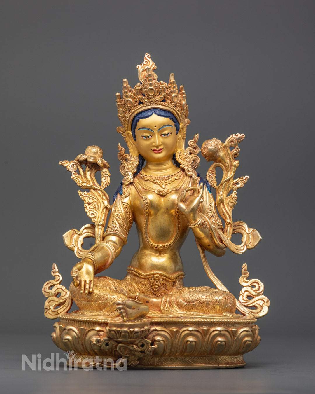 Mother Green Tara Handcrafted Sculpture seated in royal ease on lotus throne with gold-gilded face and 24k gold fire-gilded body – traditional lost wax craftsmanship from Nepal
