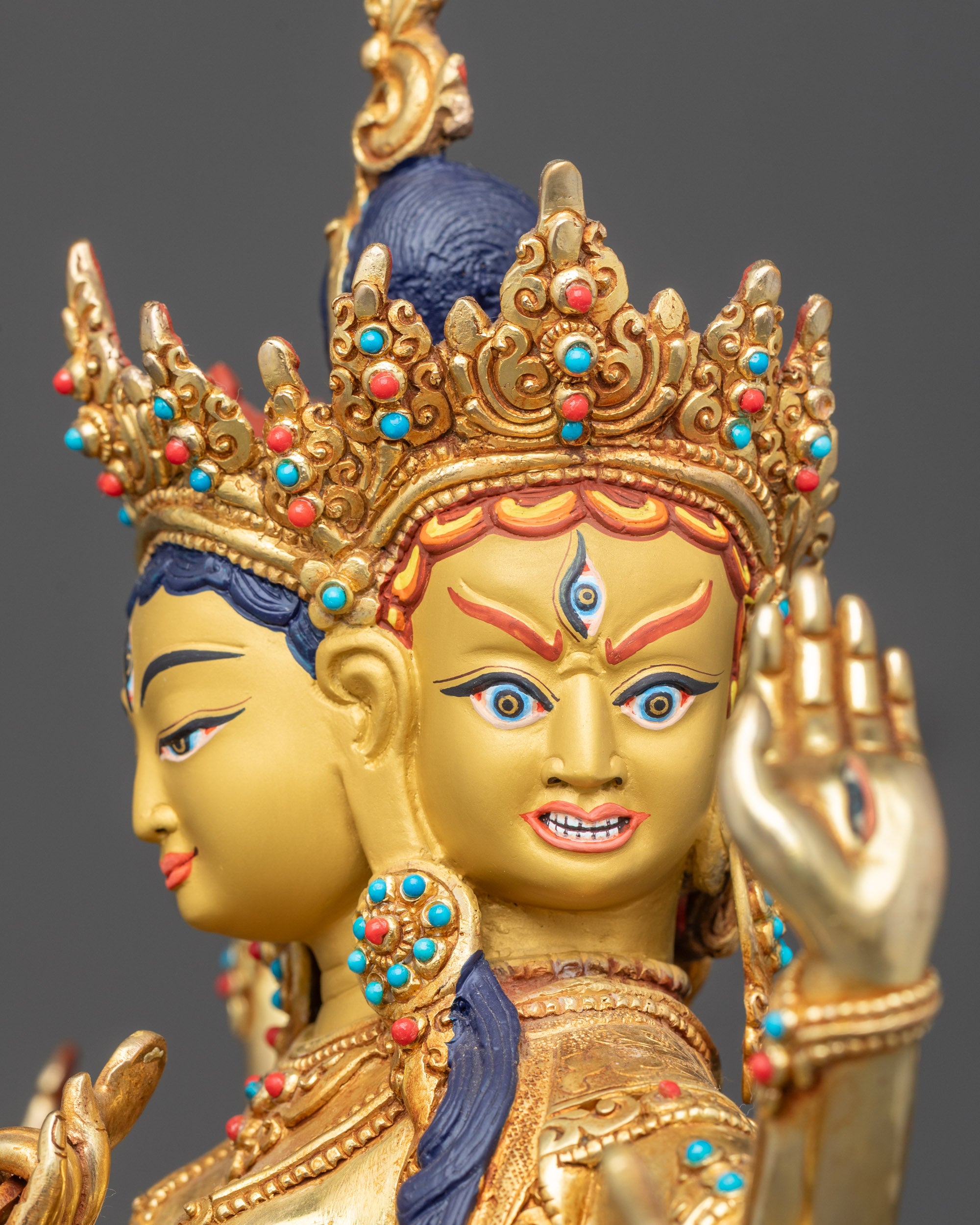 Namgyalma Ushnishavijaya statue detailed close up face showing three gold-gilded expressions