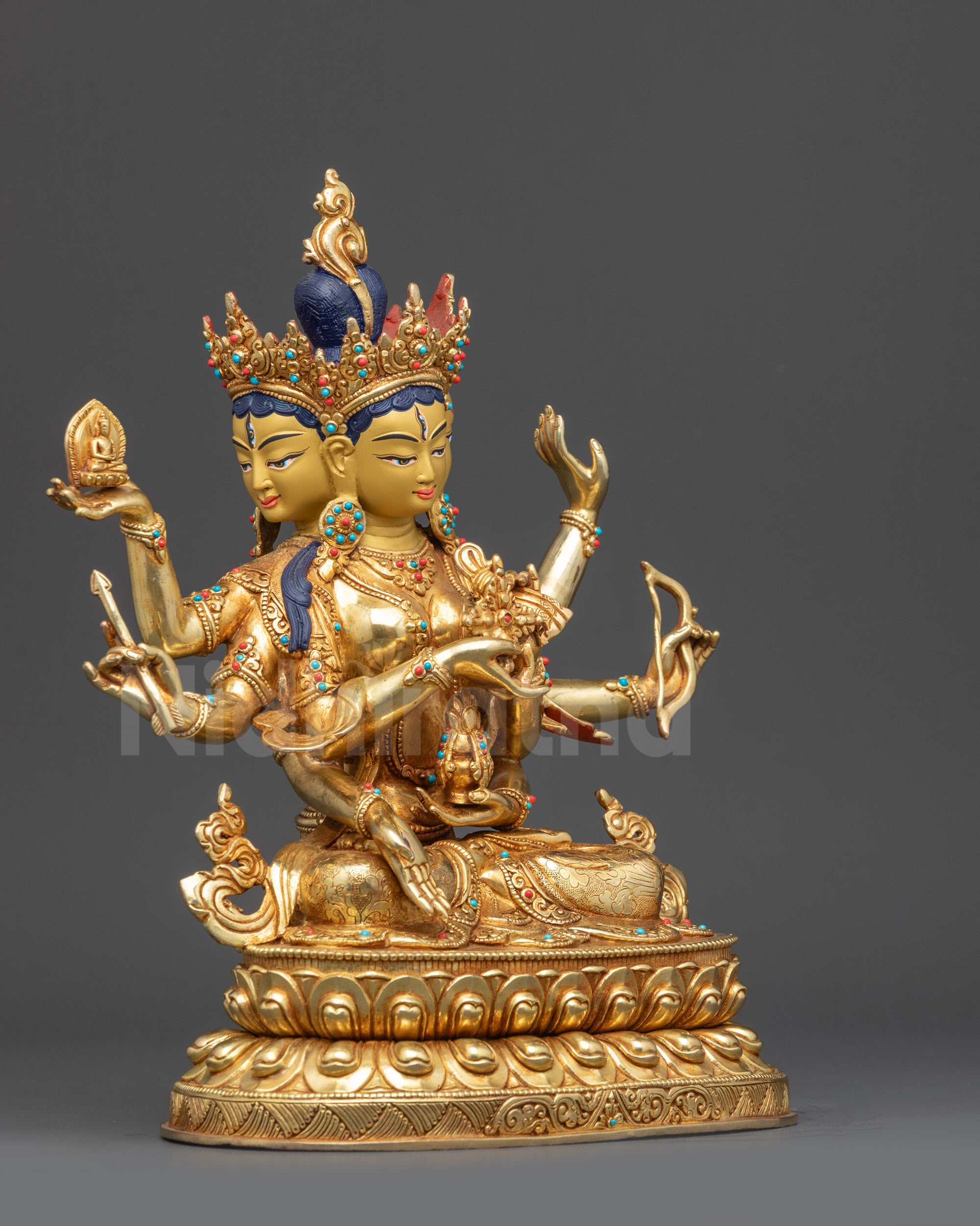 Namgyalma Ushnishavijaya statue right view side showing multiple arms and ritual attributes