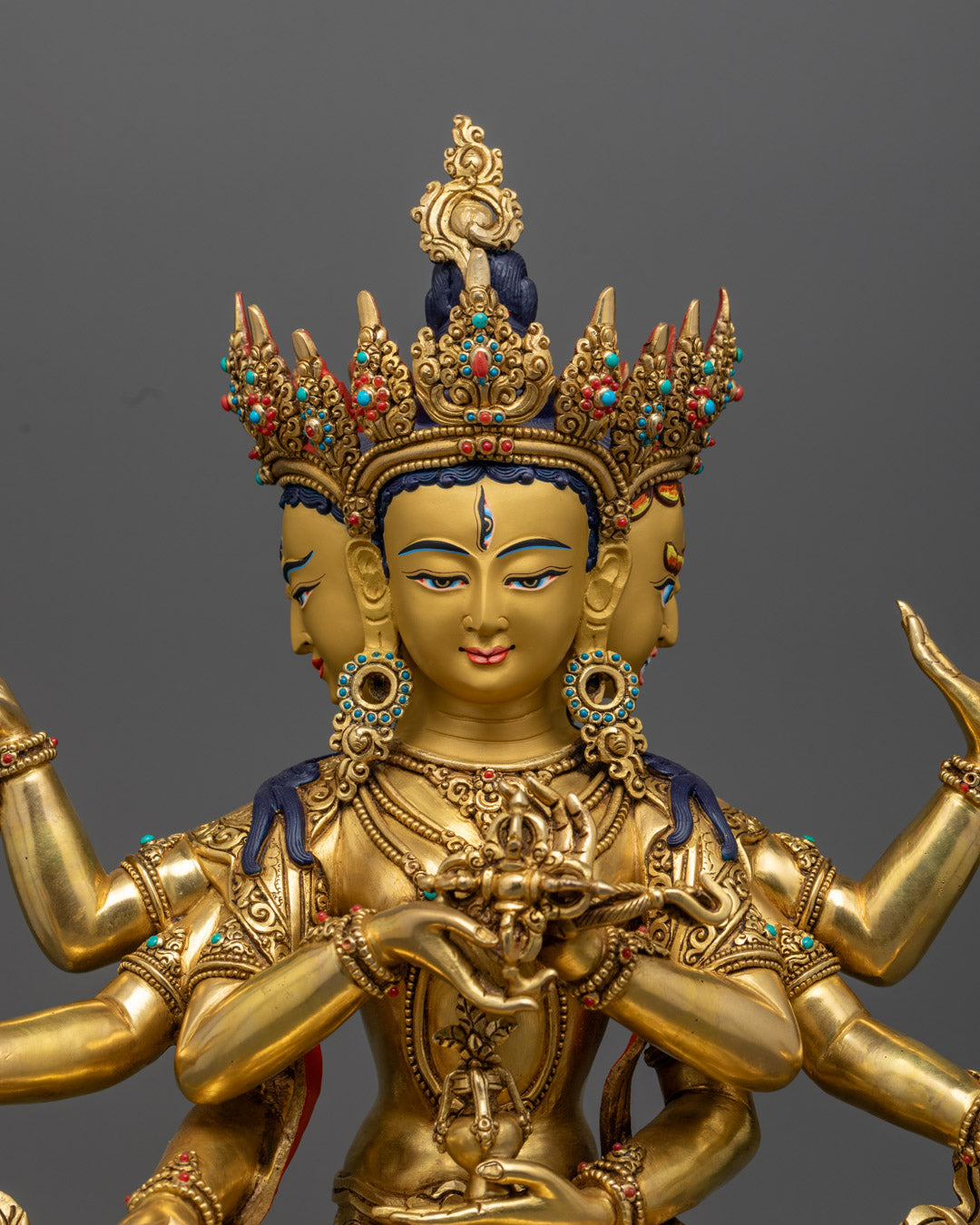 Namgyalma statue’s upper body showing the fine detailing of the faces, ornate crown, and graceful arms, handcrafted using the traditional lost wax method in Patan, Nepal