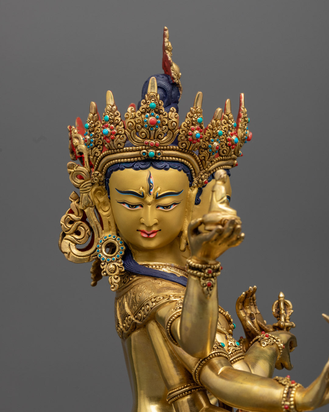 Namgyalma statue highlighting the gold gilding, flowing robes, and hidden hollow chamber at the base for consecration with sacred items