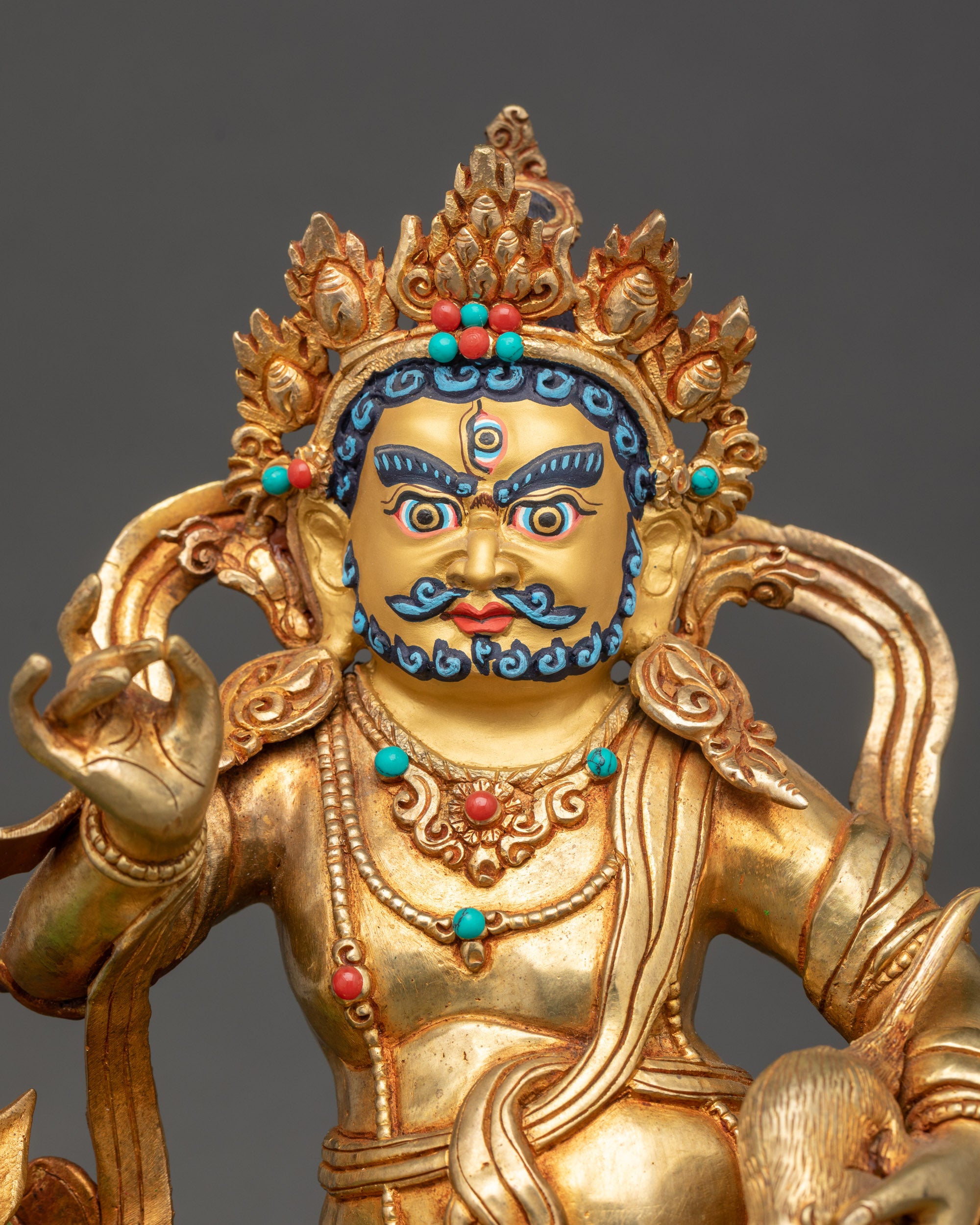 Namtoshe Statue close-up view with gold fire-gilded copper and semi-precious stones