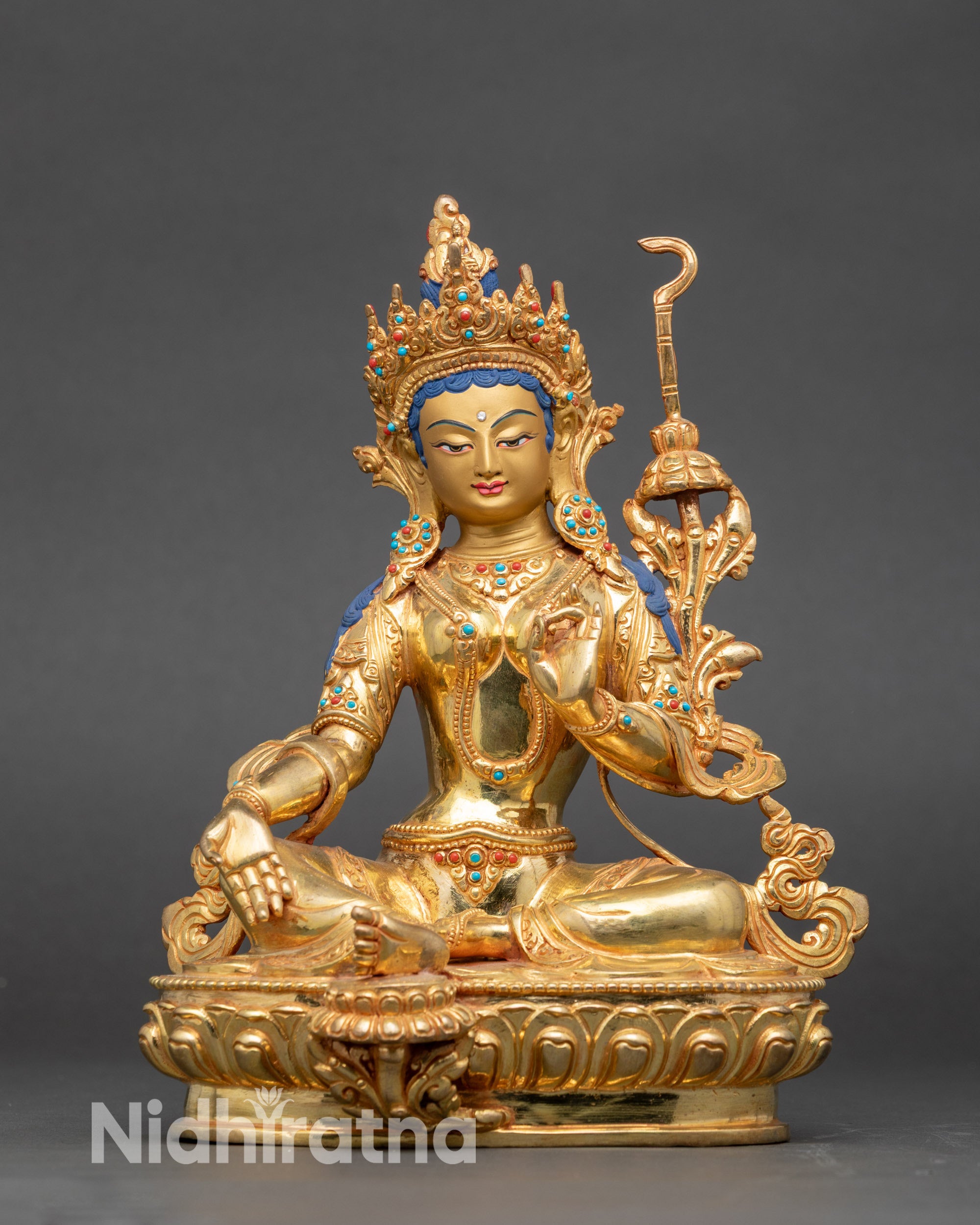 Norterma detailed side close up, holding symbolic objects with copper and gold finish