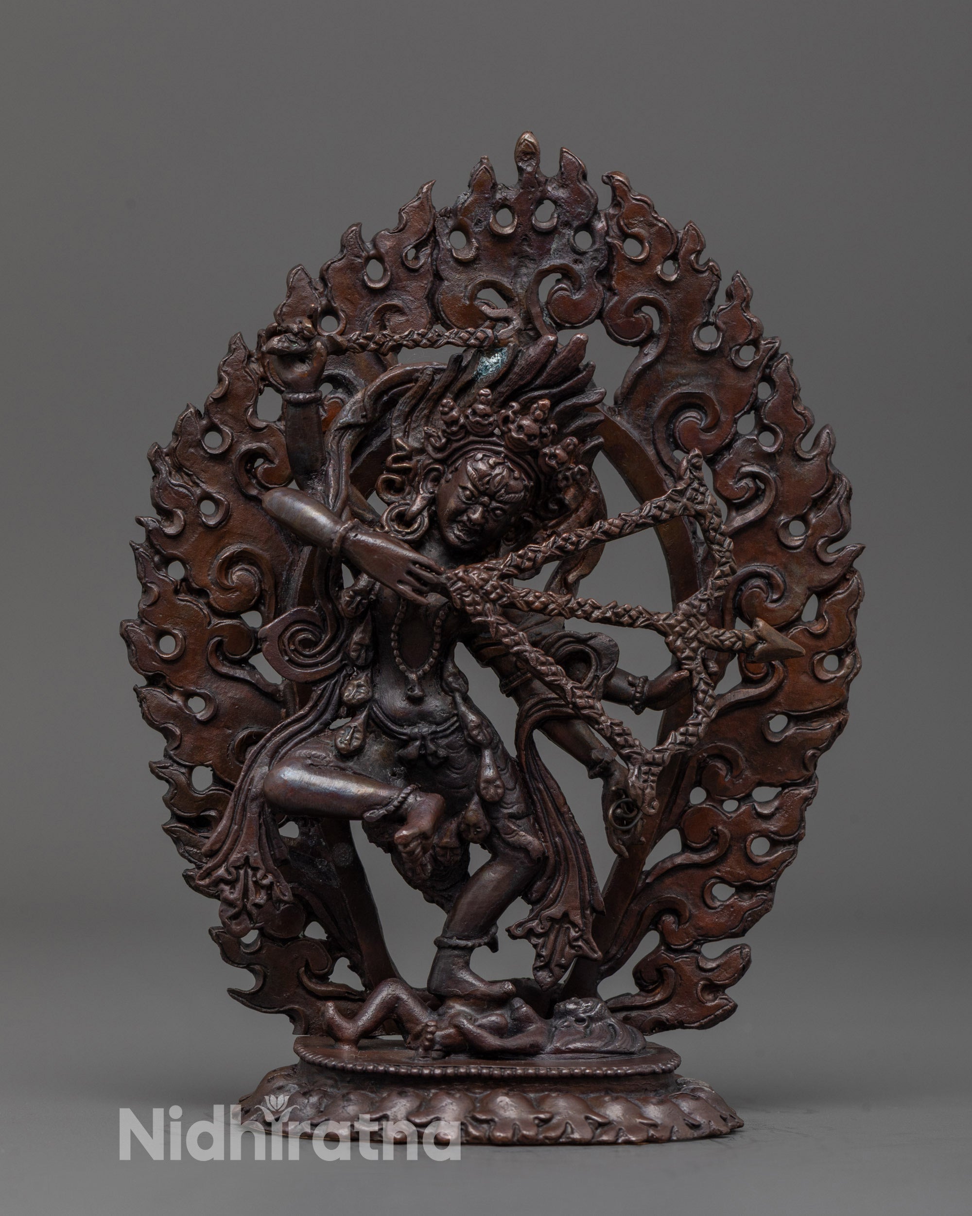 Oxidized Kurukulla Statue front view showing fierce stance and detailed bow and arrow