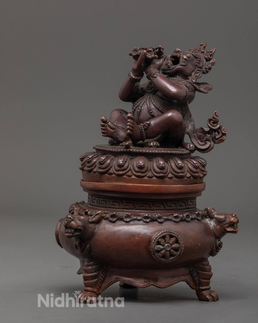 Oxidized copper Vajra Dhaka embodying the union of wisdom and compassion for meditation and rituals.