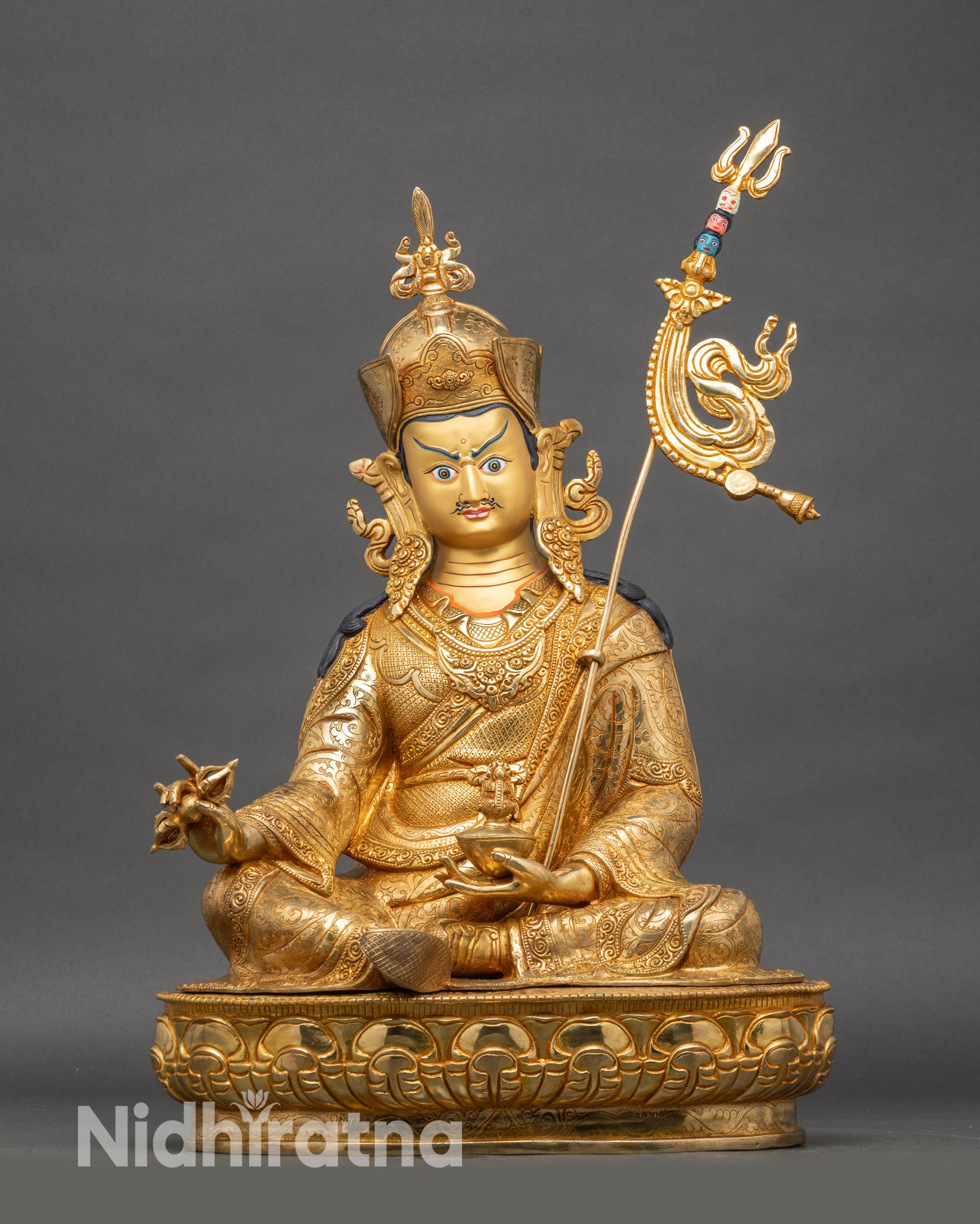 Padmasambhava Guru Rinpoche statue seated on lotus throne, copper sculpture with gold gilding