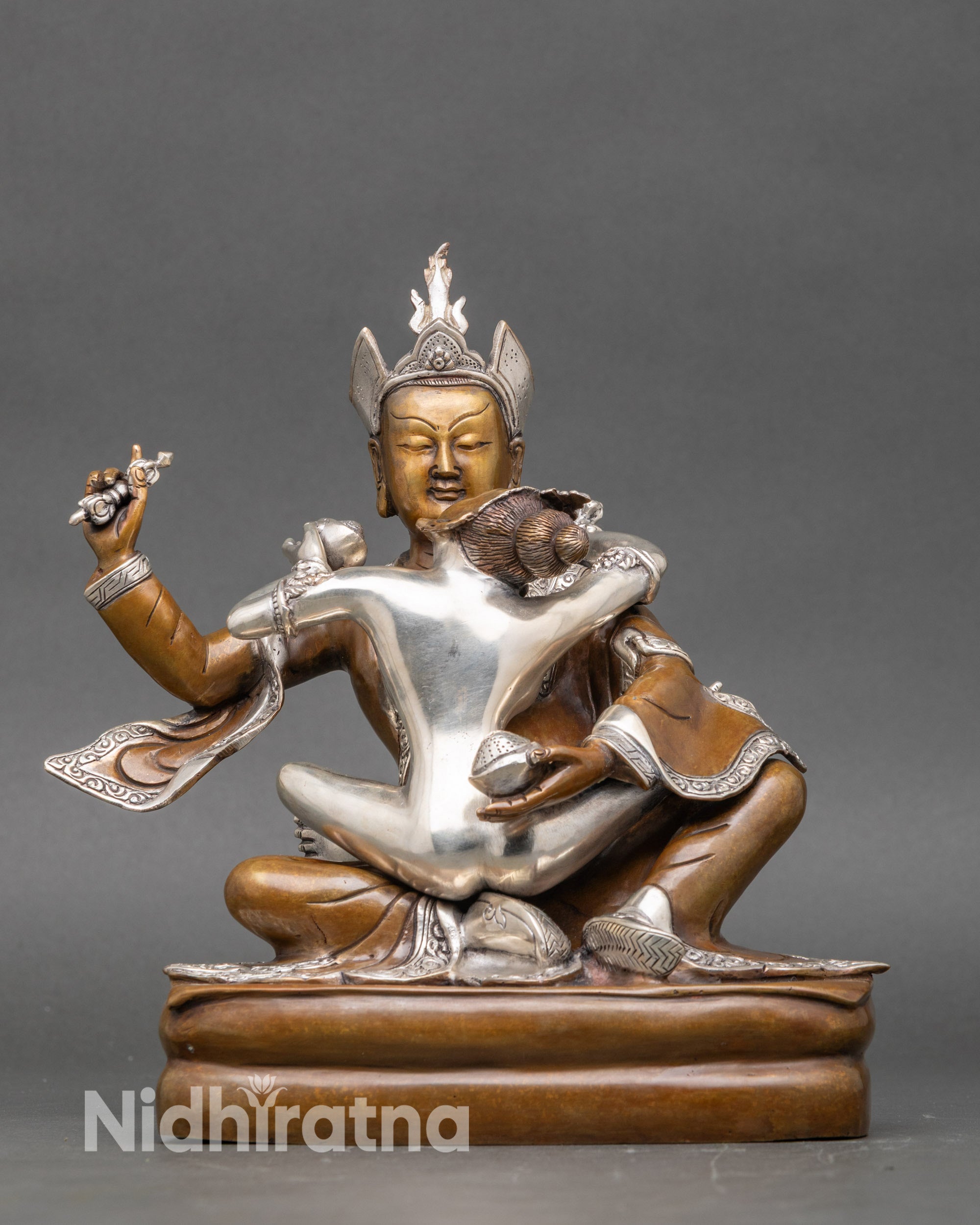 Padmasambhava Yab Yum statue with Yeshe Tsogyal, silver-plated Nepalese Buddhist art