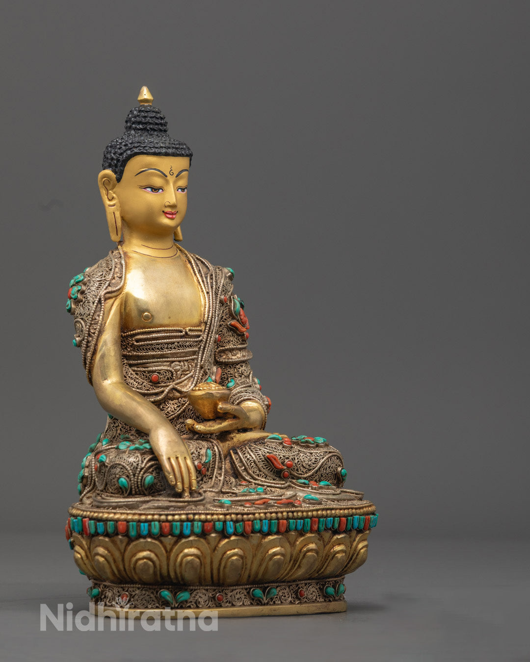Premium Shakyamuni Buddha sculpture adorned with semi-precious stones, perfect for meditation and spiritual spaces.