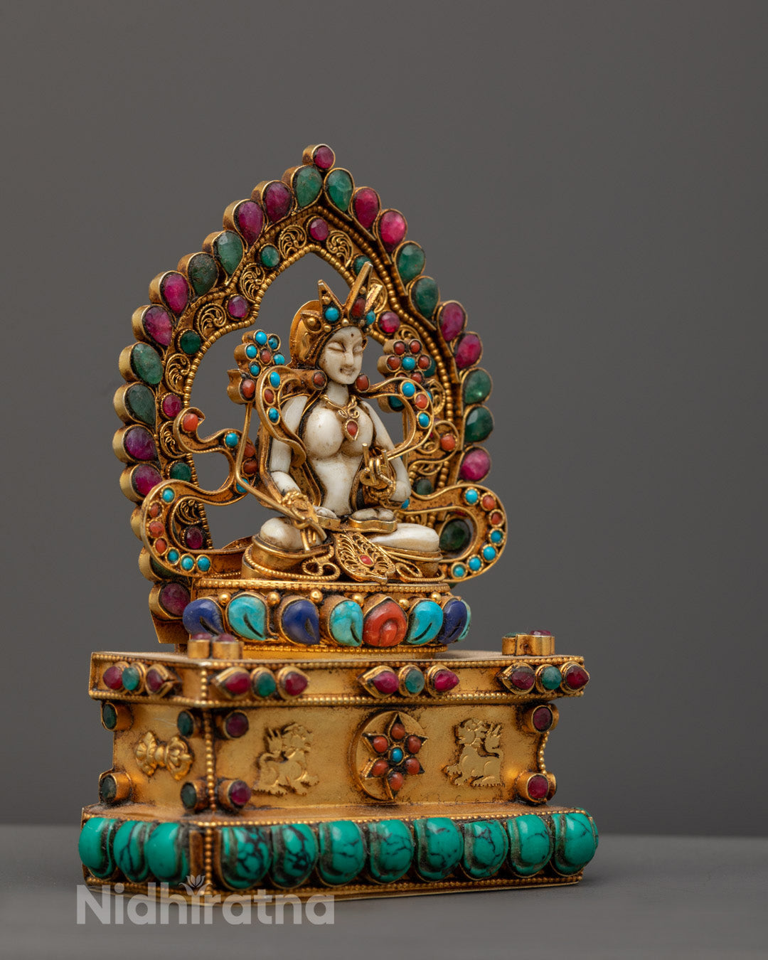 Premium White Tara statue painted with vibrant acrylic colors highlighting intricate craftsmanship and spiritual symbolism