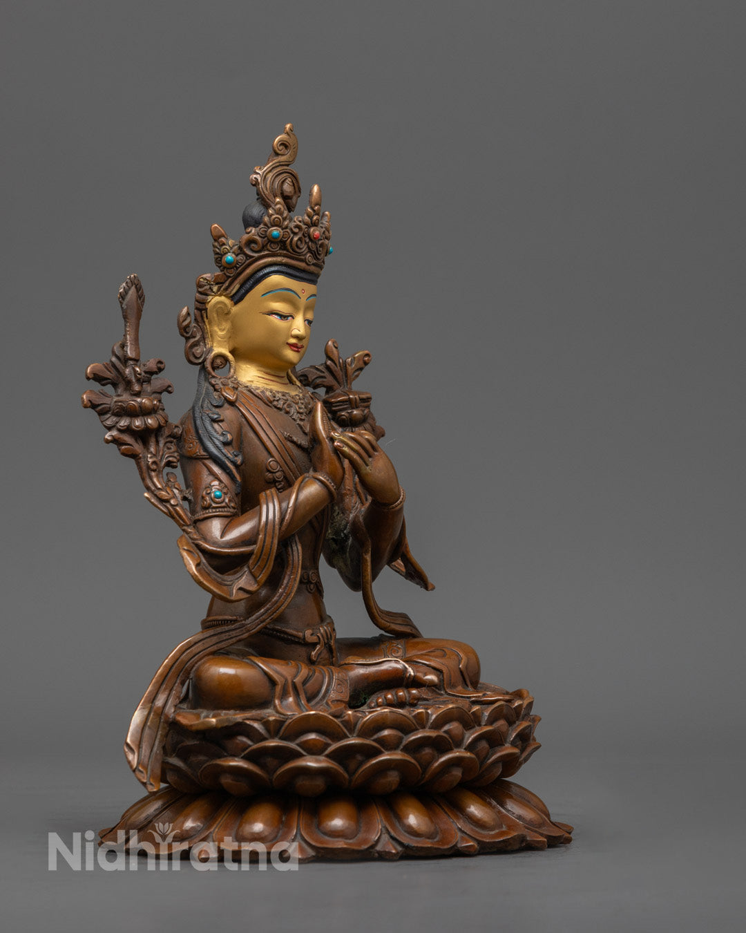 Premium copper Manjushri statue with detailed crown, utpala flowers, and lotus throne