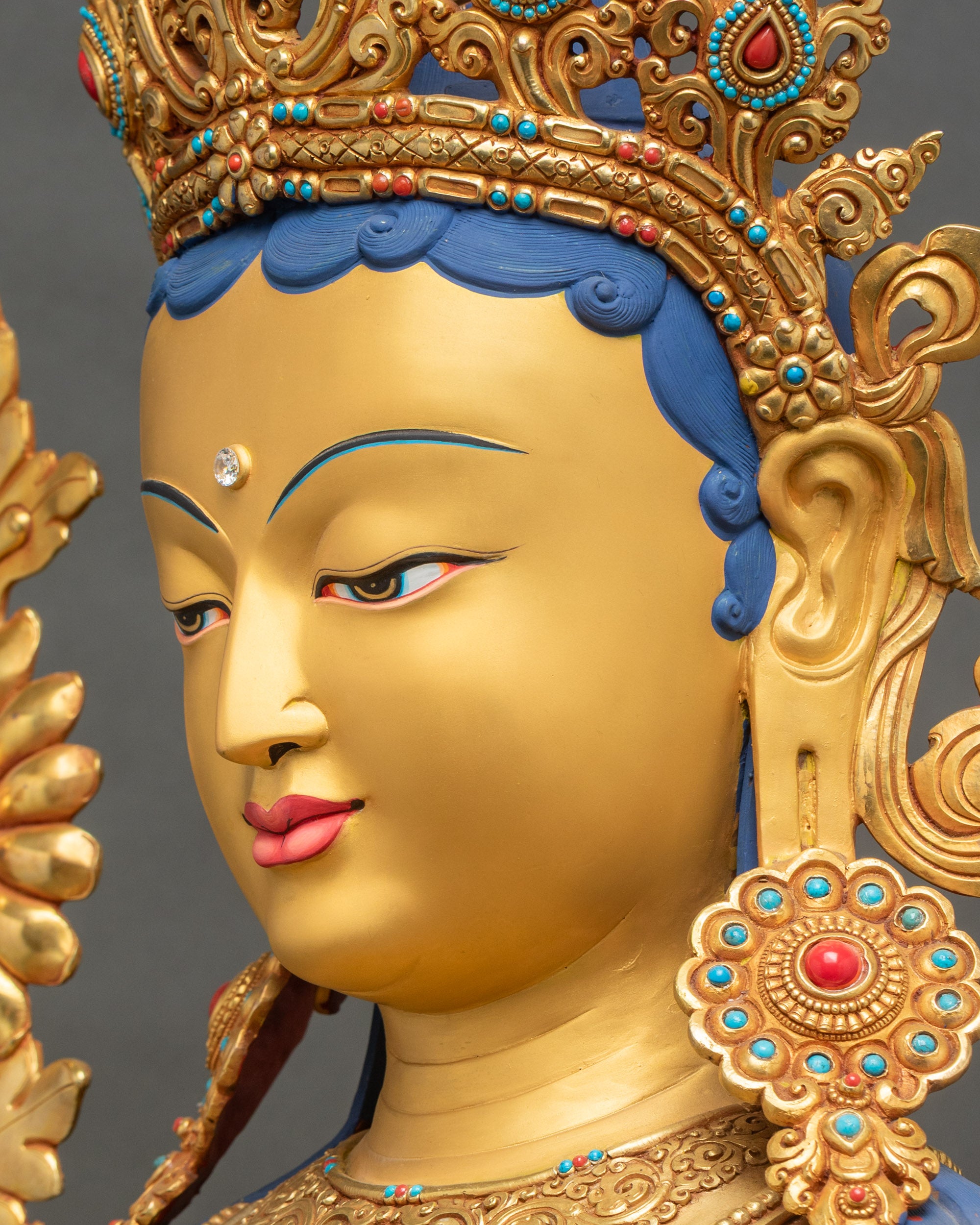 Profile of Green Tara face, hand-painted gold, spiritual presence