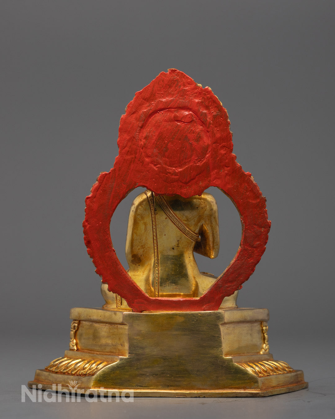 Rear view highlighting detailed carvings and acrylic colors on Vairocana Buddha’s sacred throne.