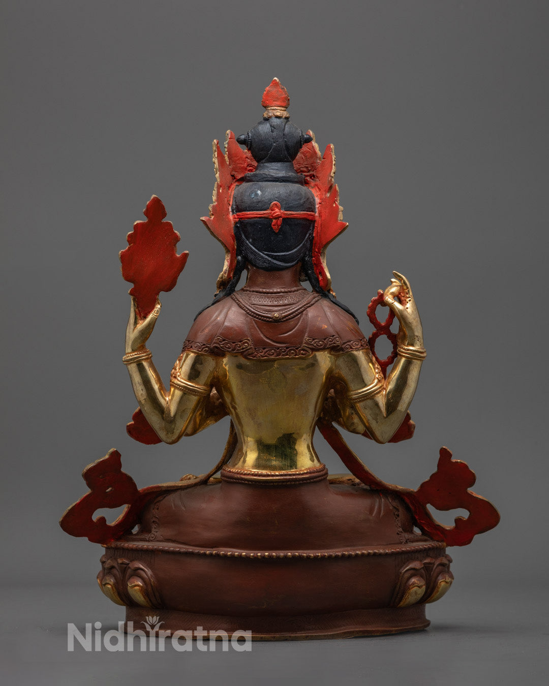 Chenrezig Statue displaying the hollow chamber for mantras and sacred relics, crafted using the traditional lost wax method in Nepal.
