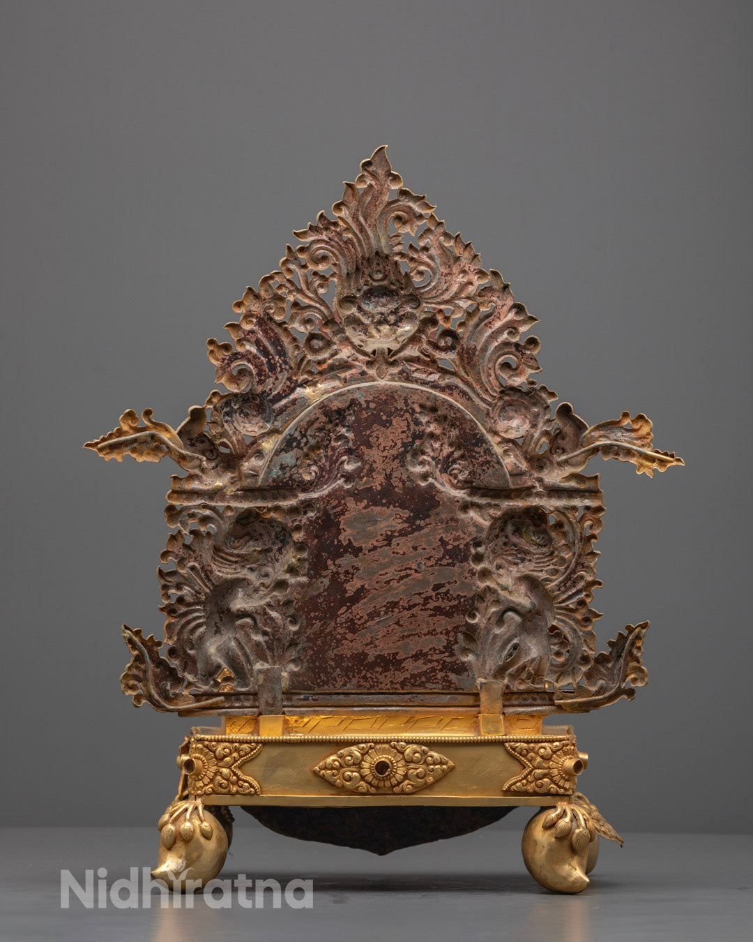 Rear view of Green Tara statue displaying hollow chamber for mantra consecration