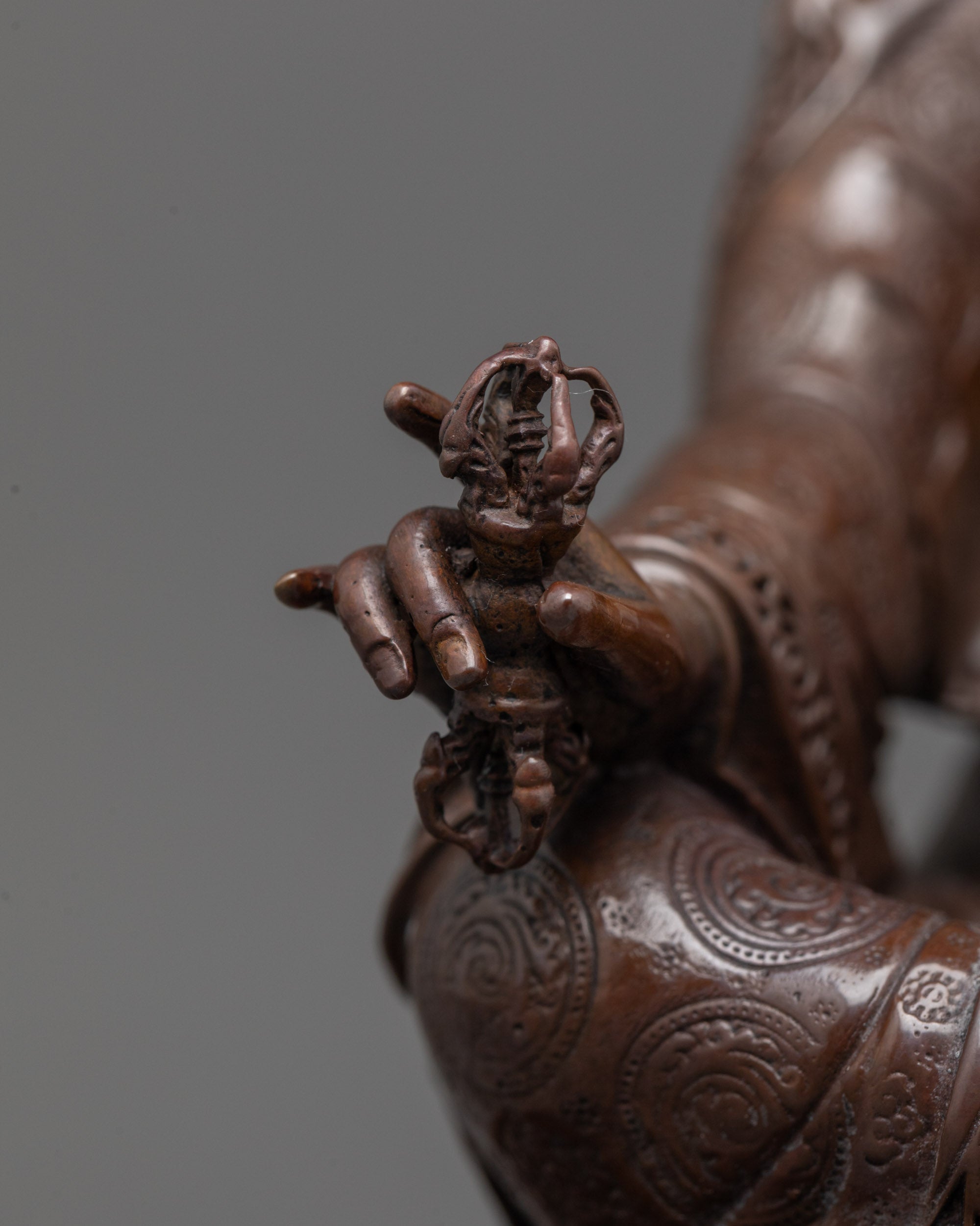 Rear view of Guru Rinpoche statue displaying halo design and intricate detailing