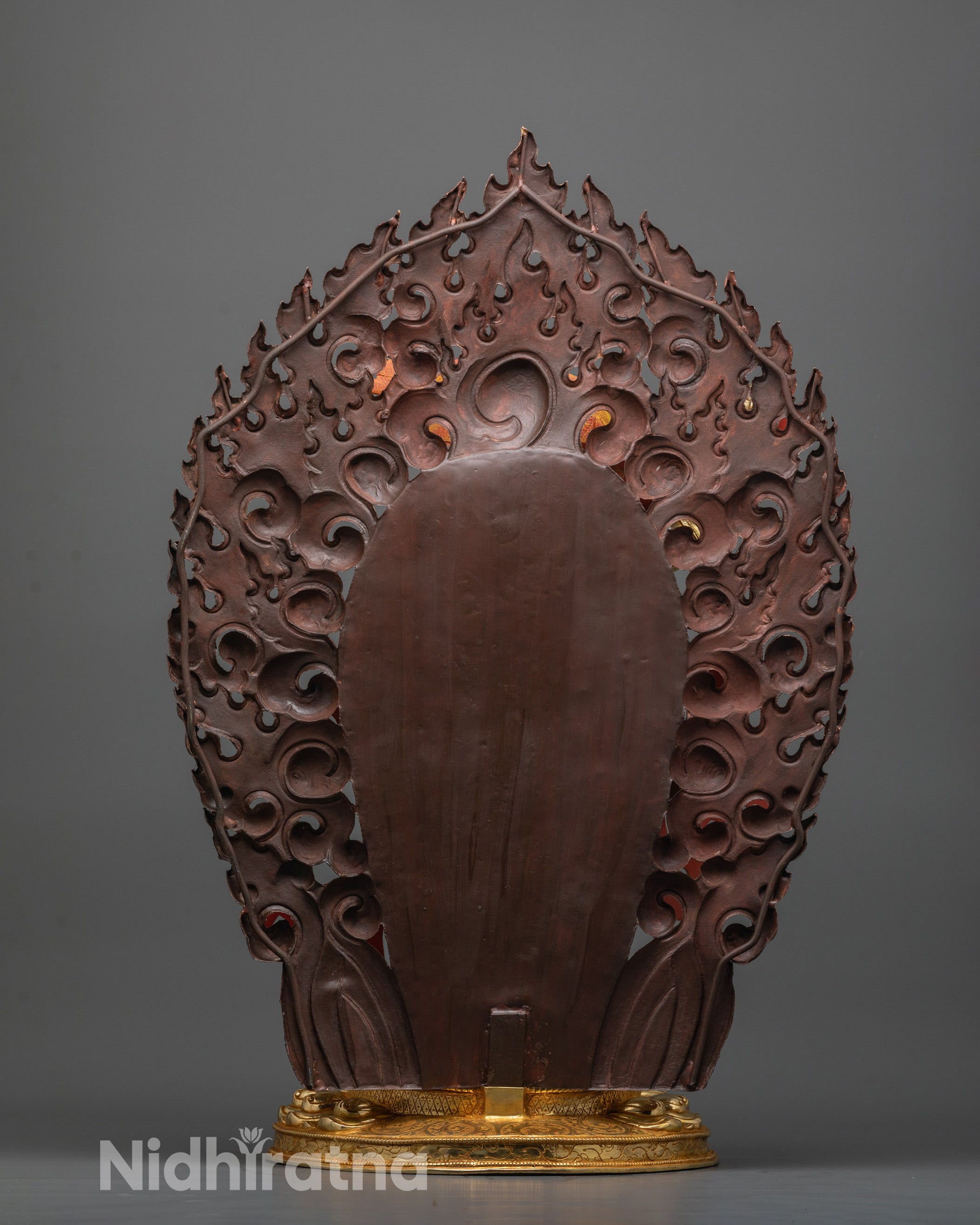 Rear view of Singha Mukha Statue highlighting flame-like halo and intricate hand-carved