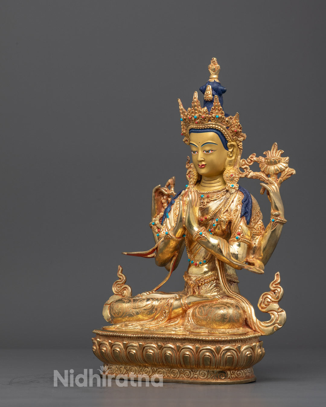 Rear view of the Chenrezig statue highlighting the fine details of the robe
