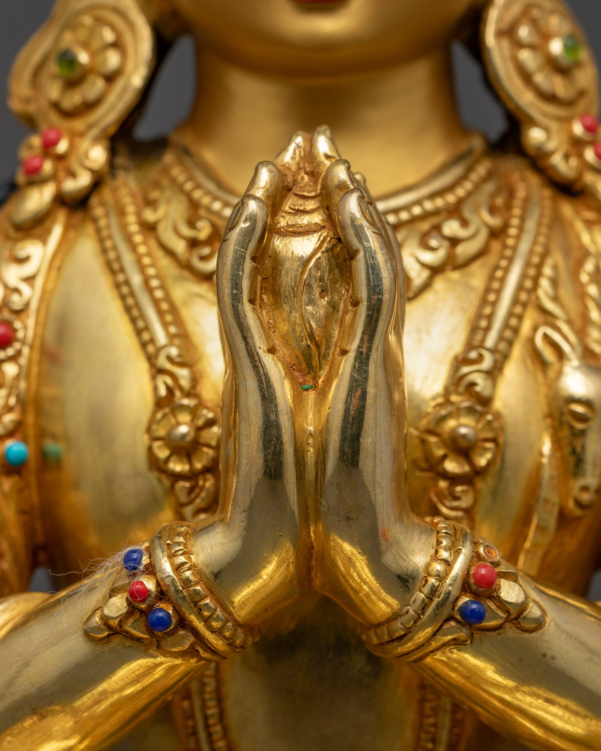Rear view of the Chenrezig statue made from copper base with fire gilded 24k gold
