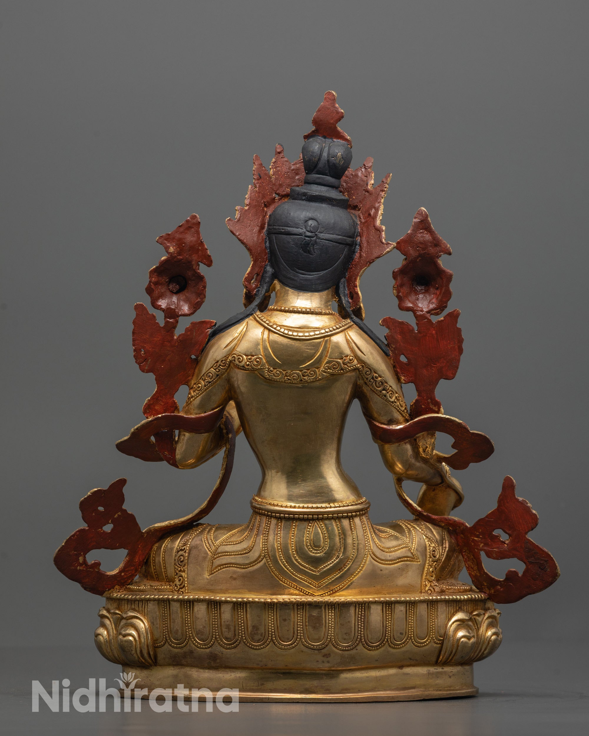 Rear view of the Green Tara Statue displaying the flowing robe design