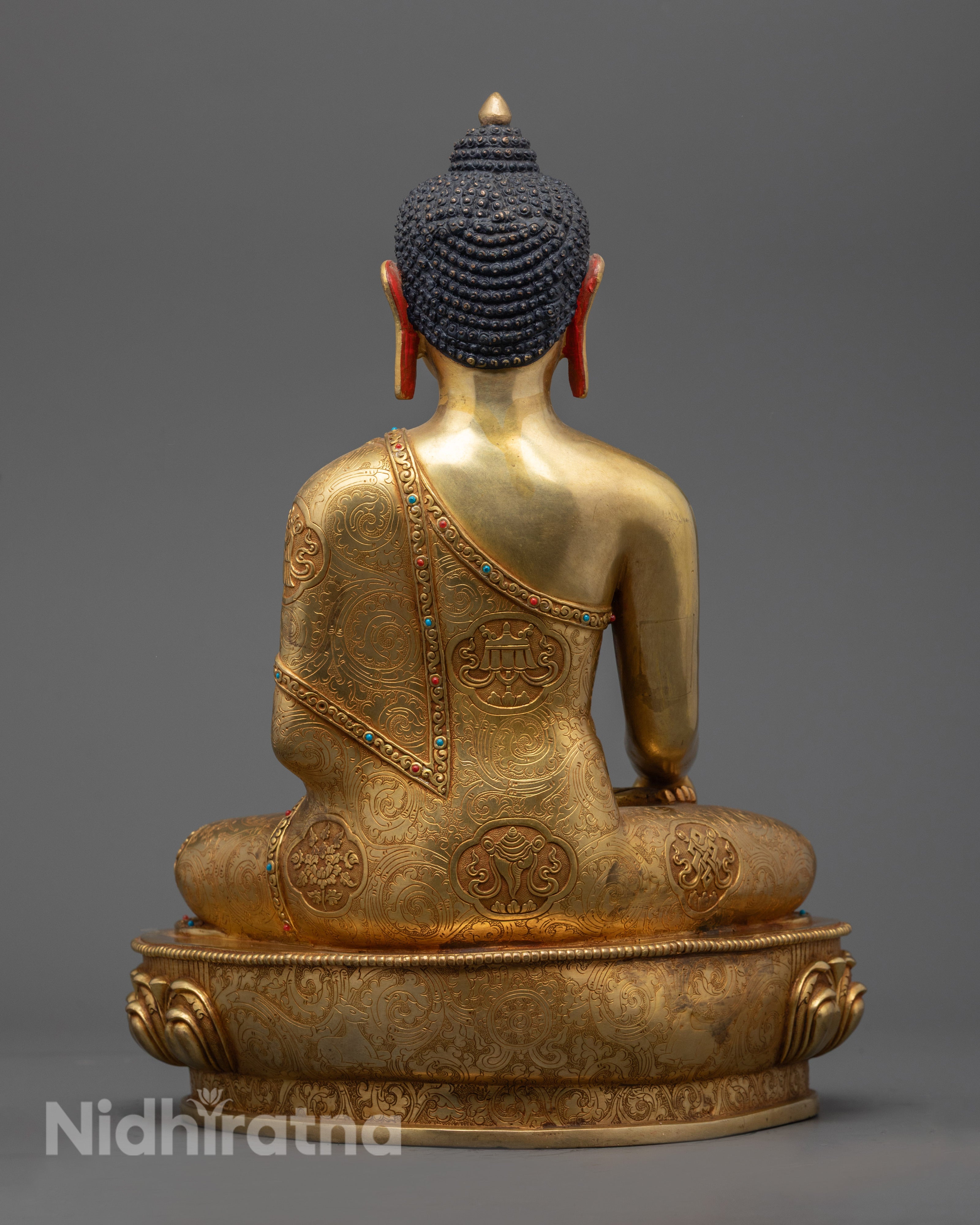 Shakyamuni Buddha Statue revealing the hidden hollow space for placing auspicious mantras and sacred substances.