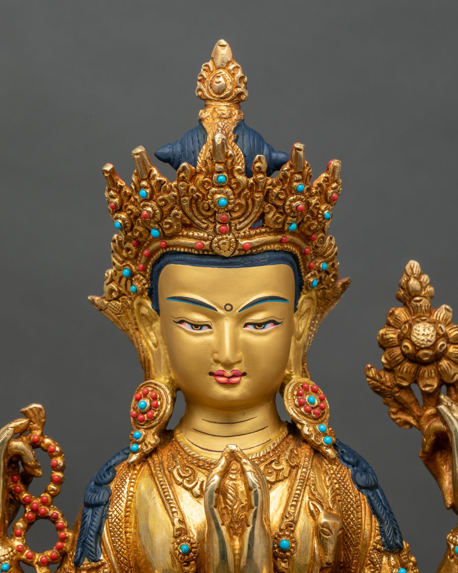Regular close-up of Avalokiteshvara statue showing intricate copper and gold details