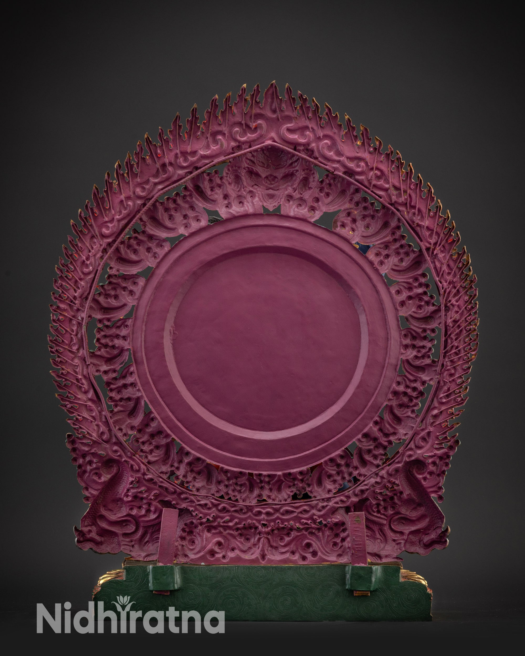 Regular back view of Vajrapani statue showing multicolored flaming halo details