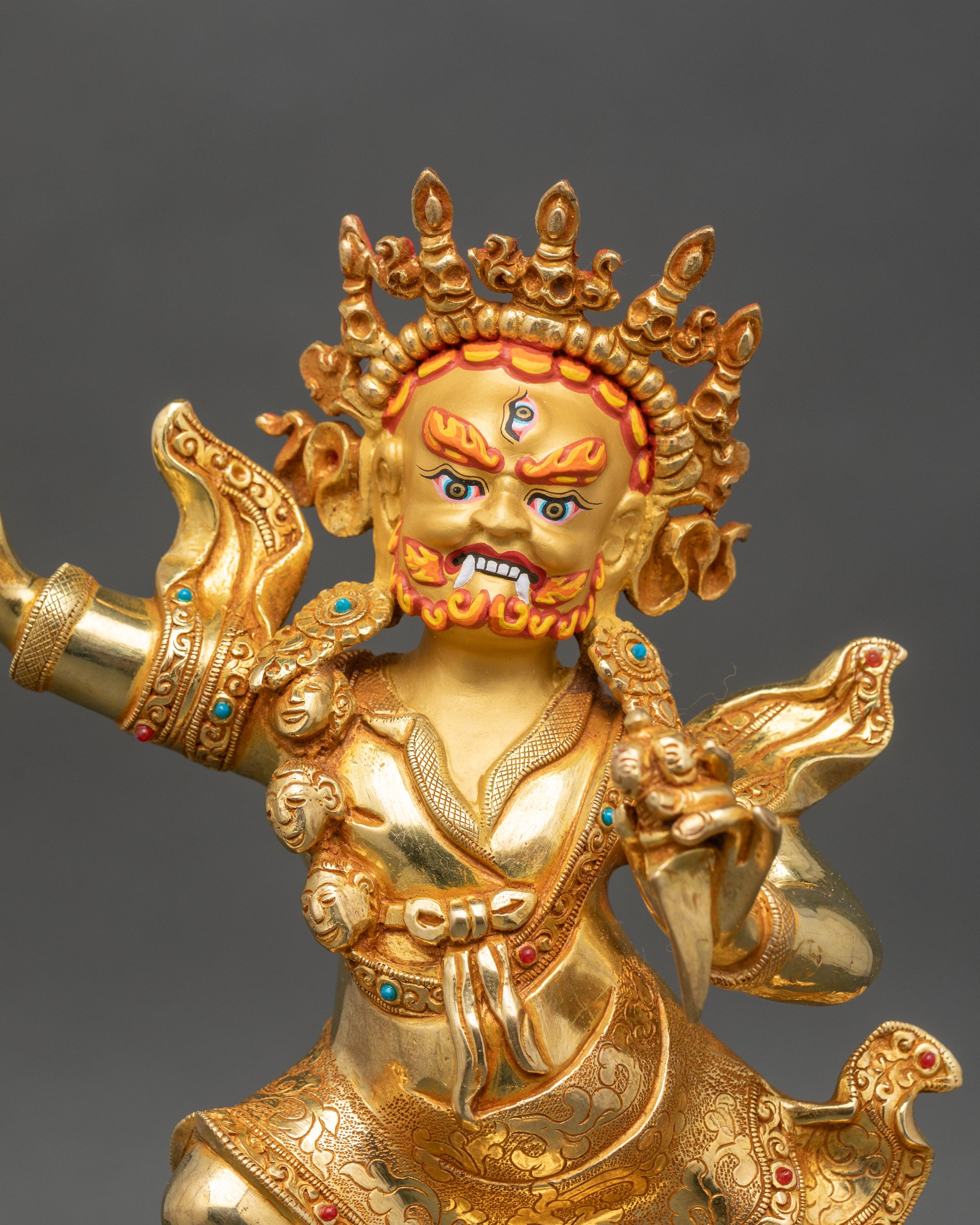 Regular close-up – Close-up of Dorje Drolo statue showing intricate copper and gold fire-gilded details
