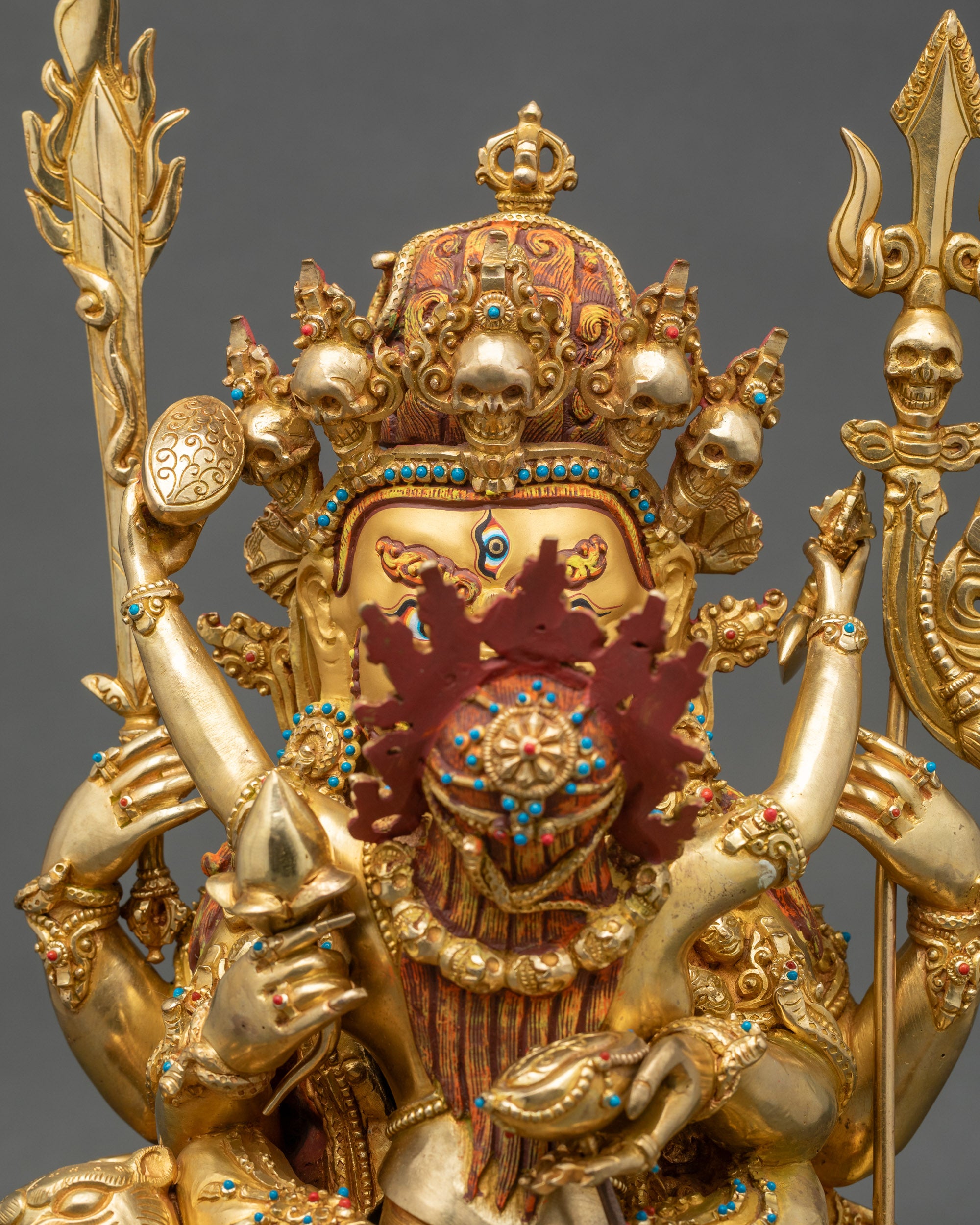 Regular close-up of Hayagriva Yab-Yum sculpture, fire-gilded copper with intricate details