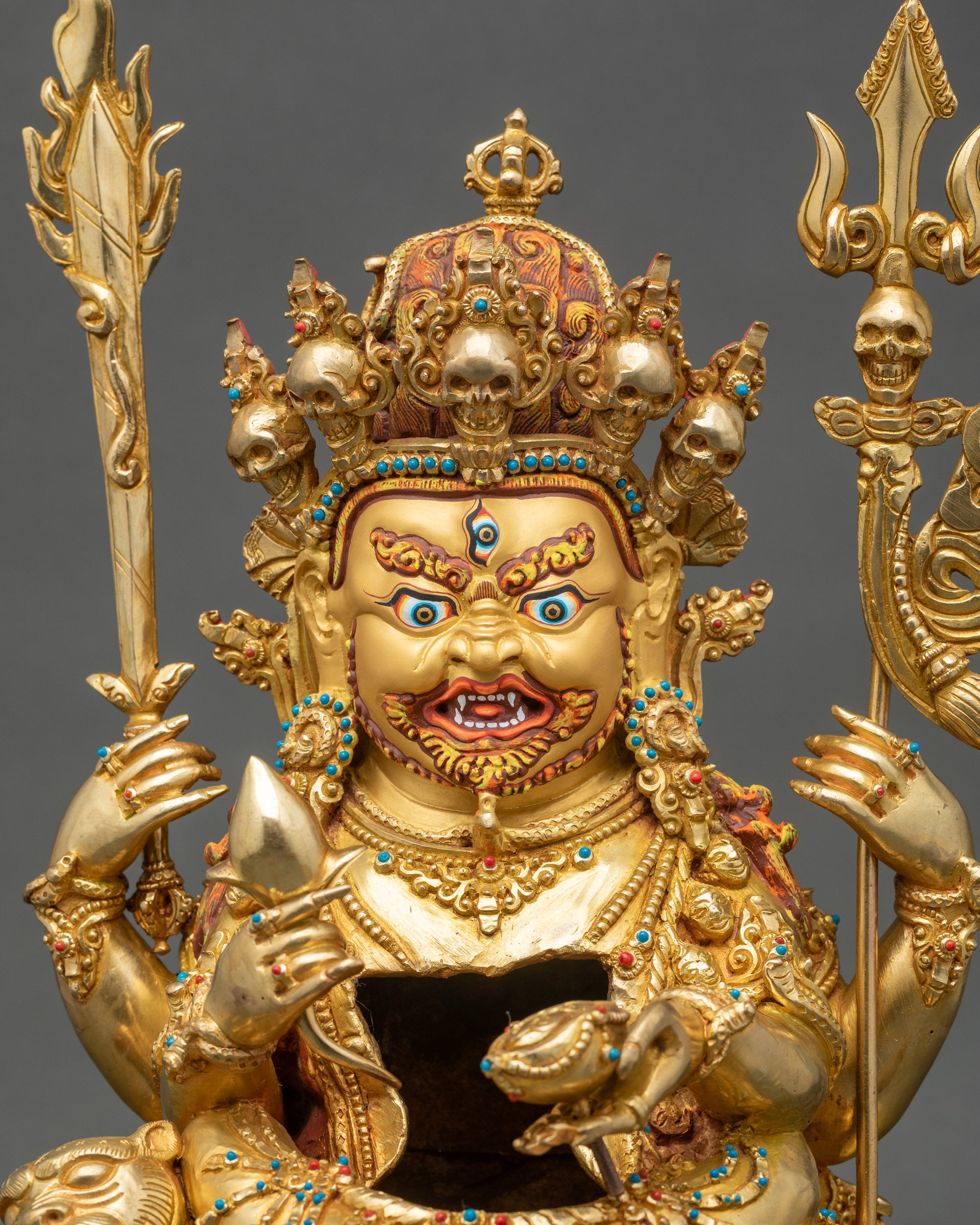 Regular close-up of Hayagriva sculpture, gold fire-gilded copper with intricate details