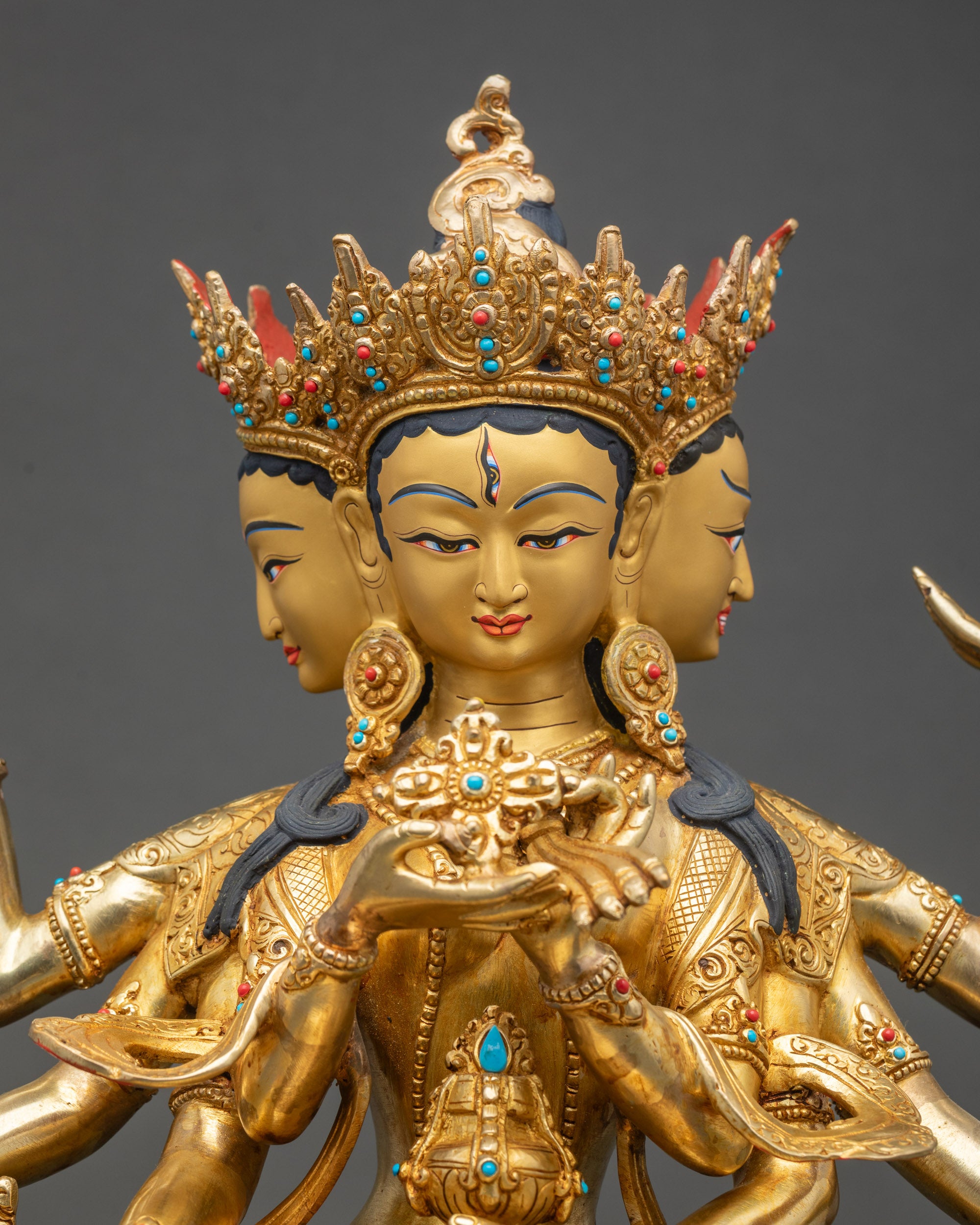 Regular close-up of Namgyalma Bodhisattva figurine showing gold fire-gilded copper details for altar display