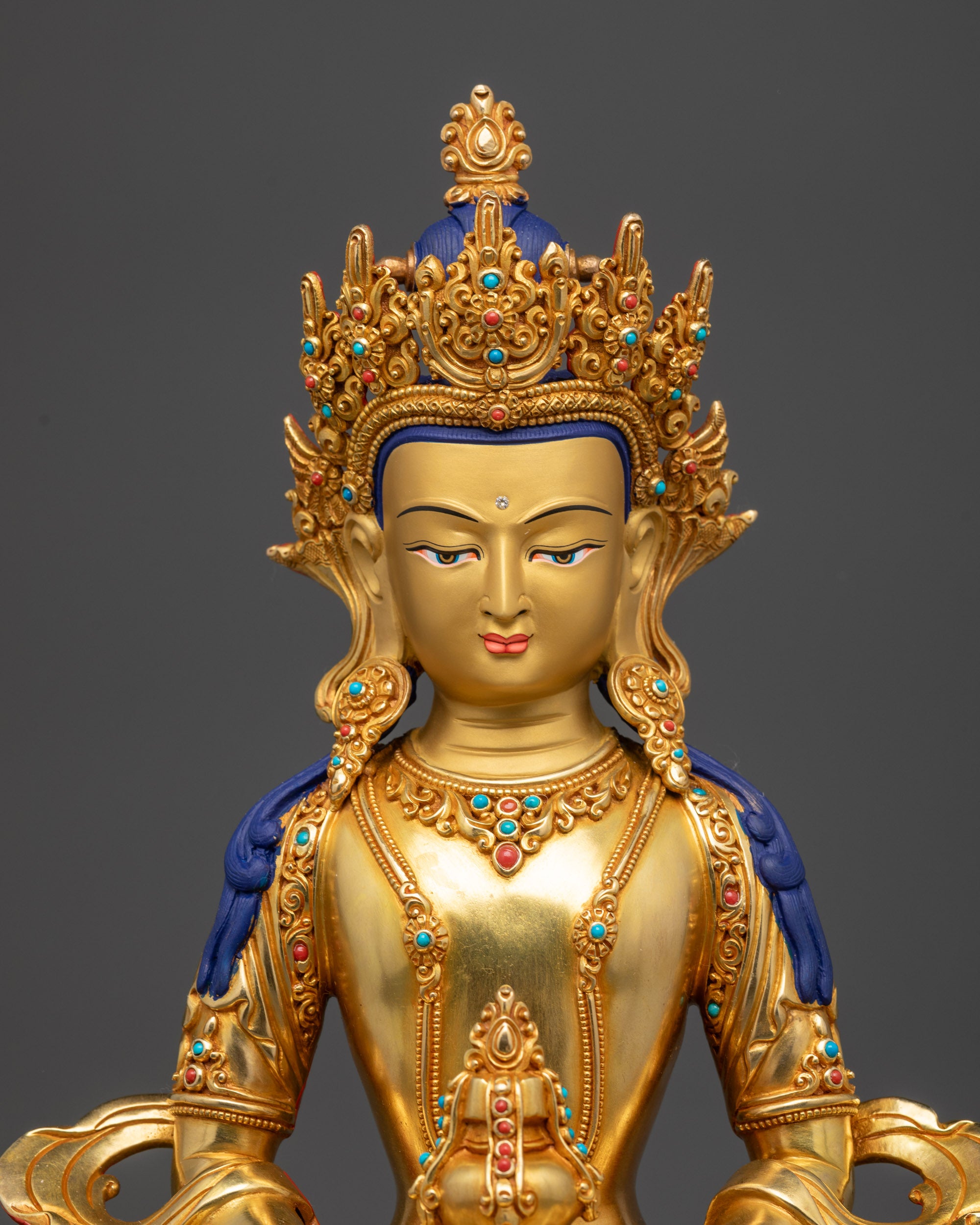 Regular close up Amitayus Buddha holding long-life vase with detailed robe and jewelry