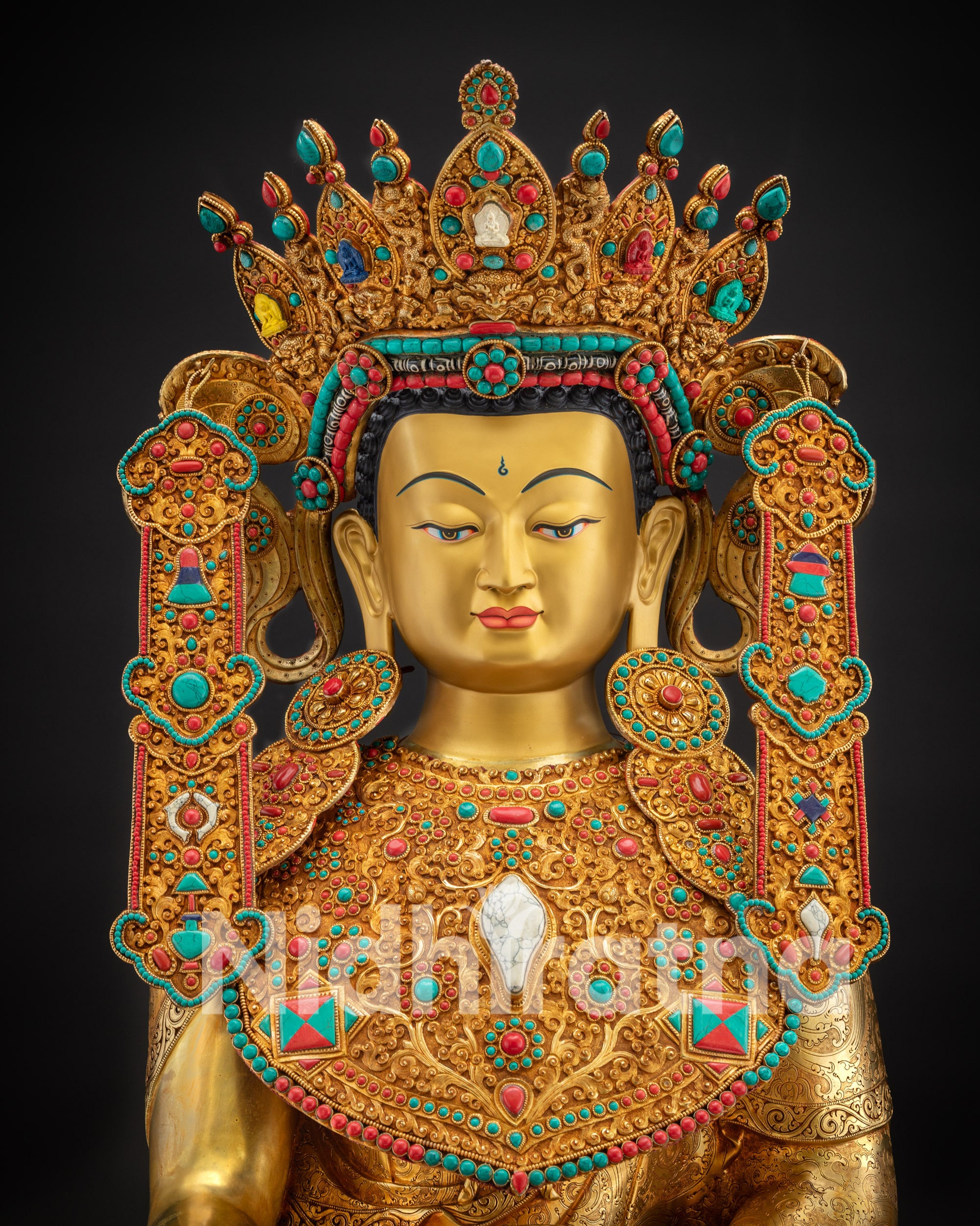 Regular close up Jowo Rinpoche Buddhist deity statue with gold gilded sacred ornamentation