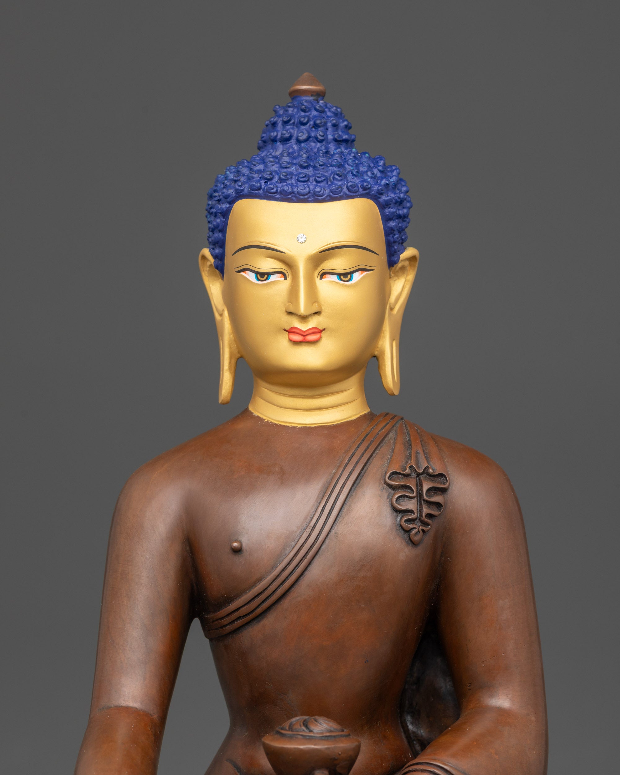 Regular close up Oxidized Shakyamuni Buddha statue showing intricate robe patterns