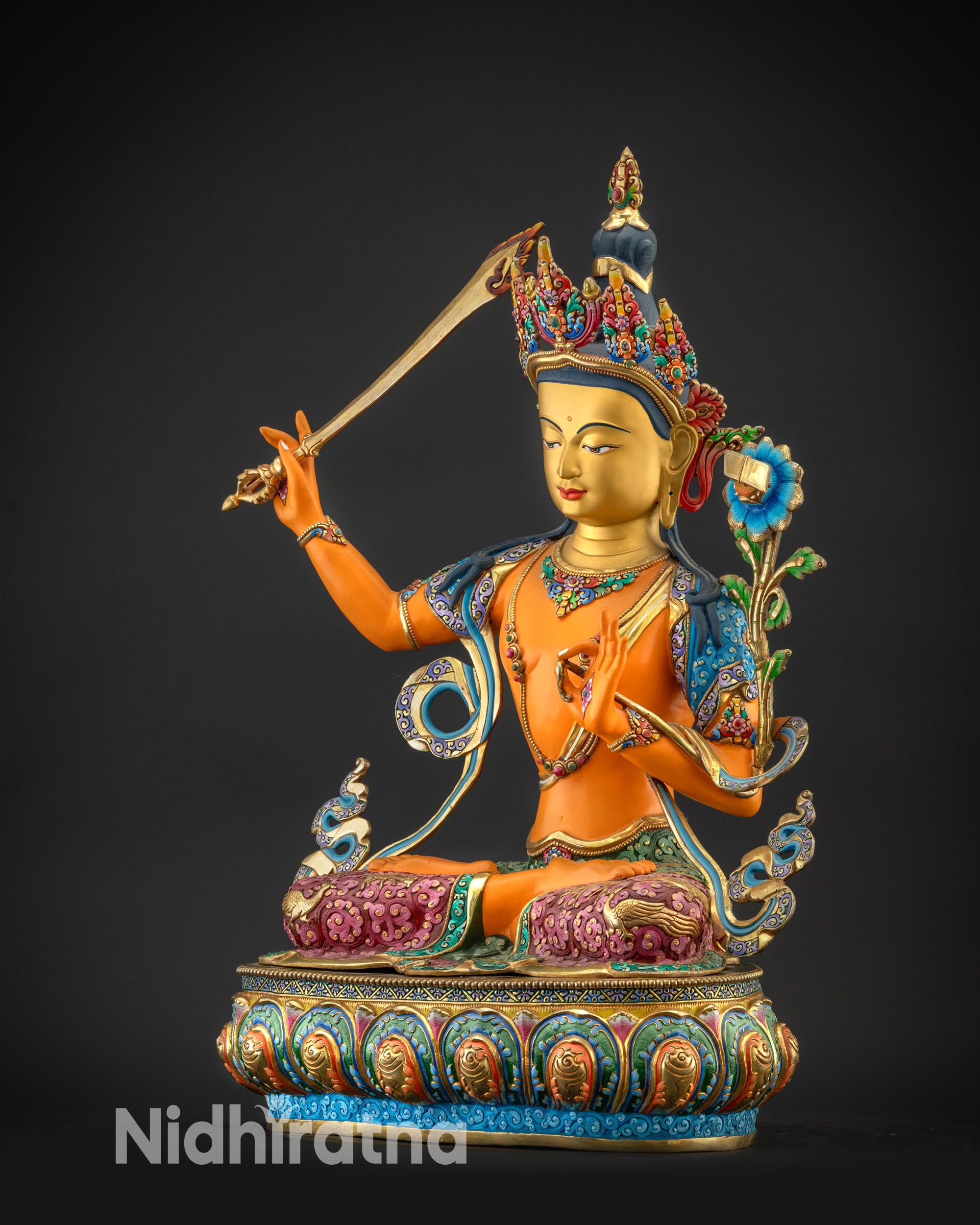 Regular side left of Manjushri statue displaying floral motifs and semi-precious stones