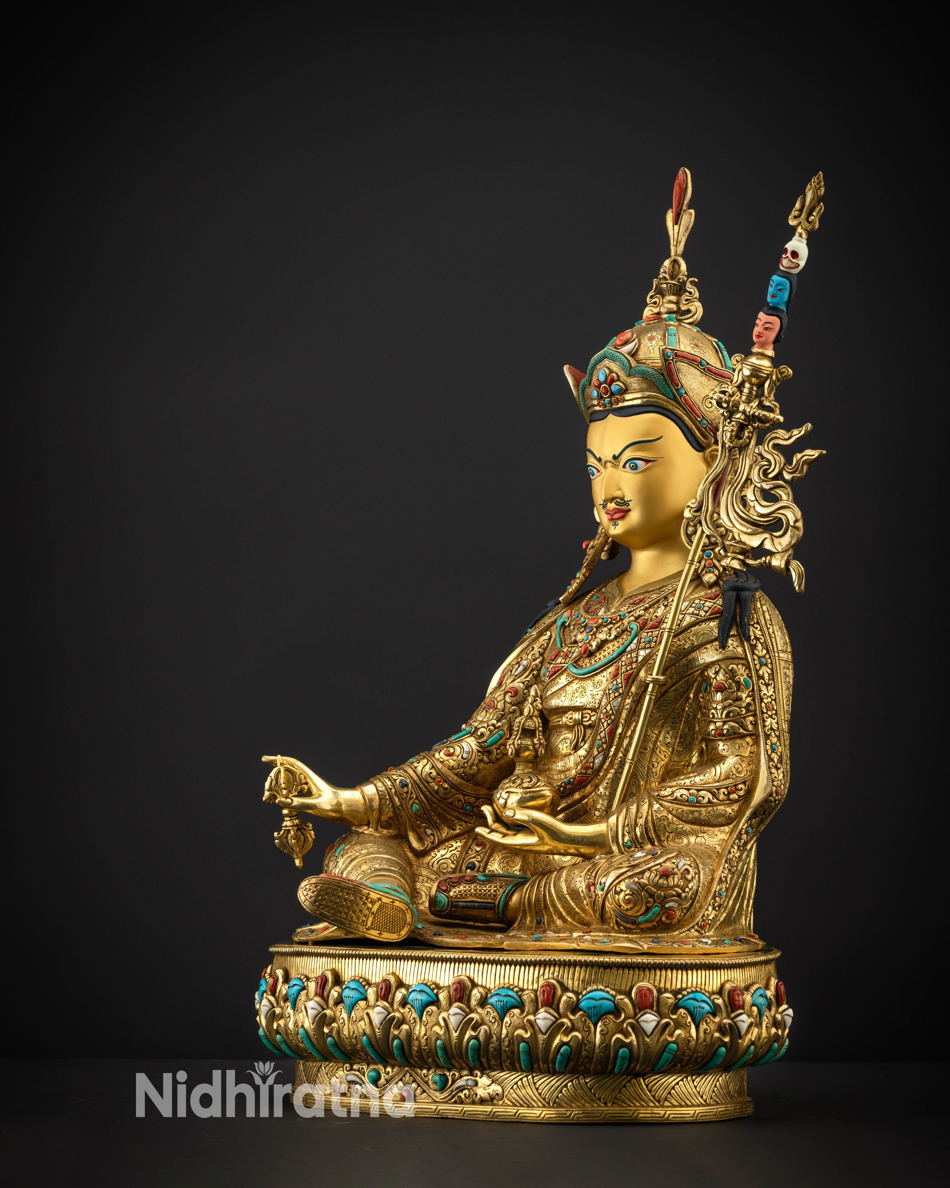 Regular side left view of Guru Padmasambhava statue with detailed carvings