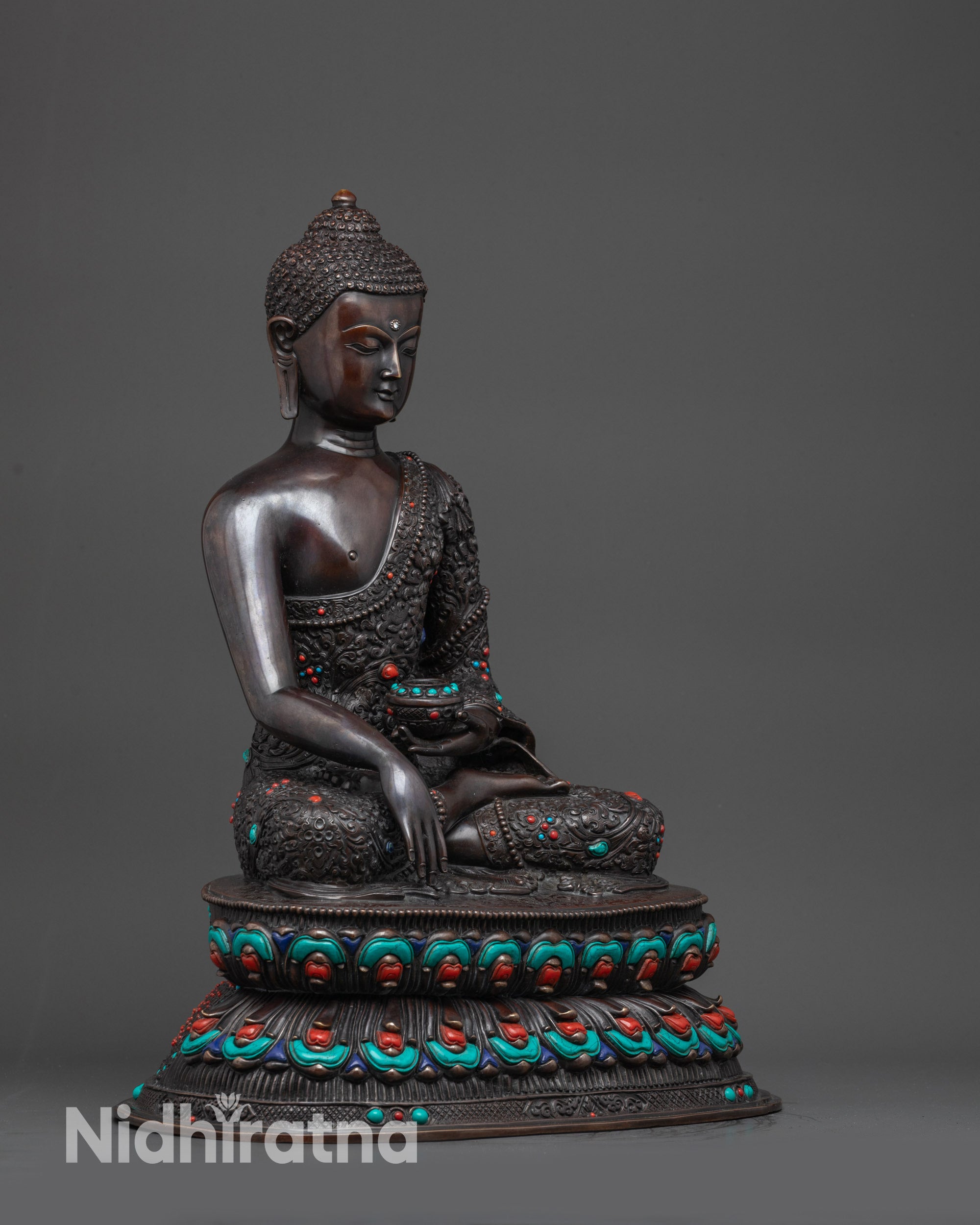 Regular side right Buddha Shakyamuni oxidized statue showing flowing monk robe details