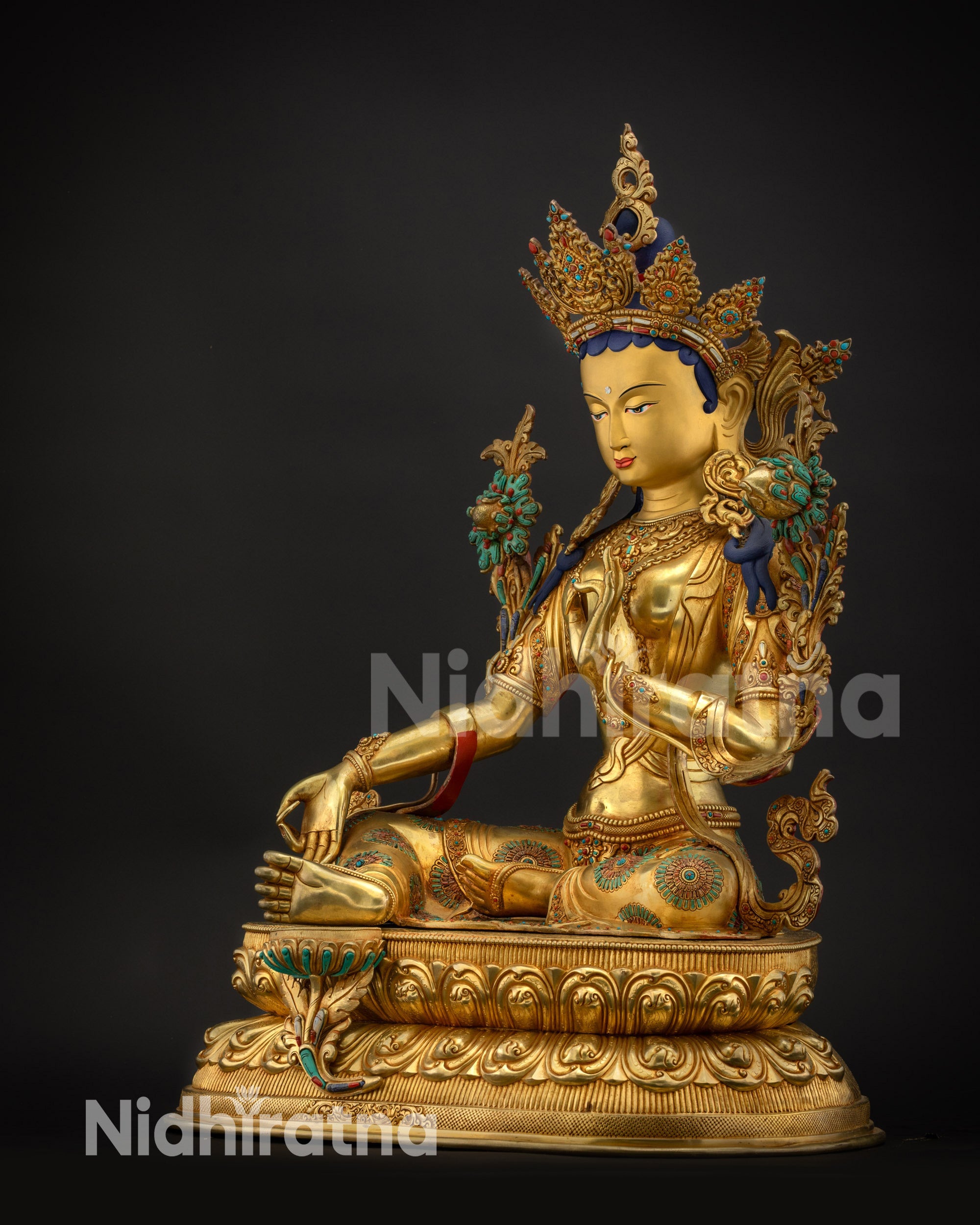 Regular side right view of Green Tara statue with gold fire-gilded ornaments
