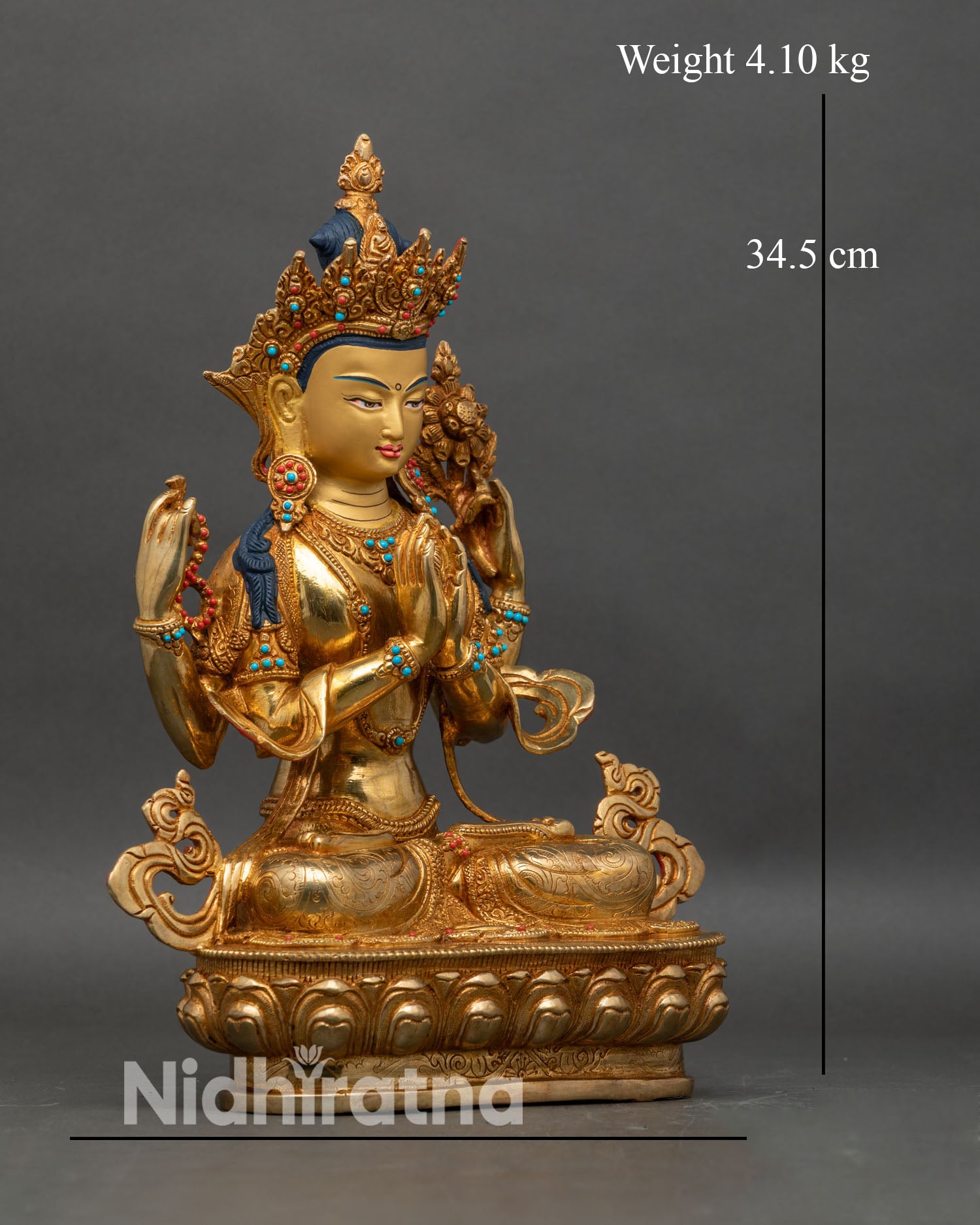 Right profile of Avalokiteshvara statue, seated on lotus, holding chintamani and crystal rosary
