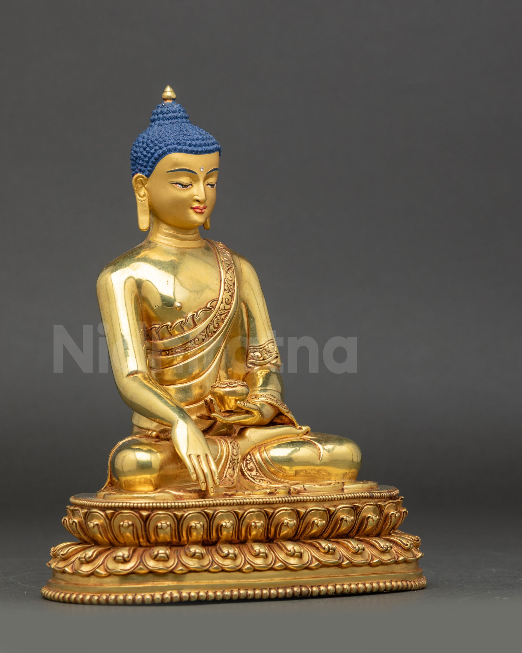 Right-side view of Nepalese Shakyamuni Buddha statue on double lotus base