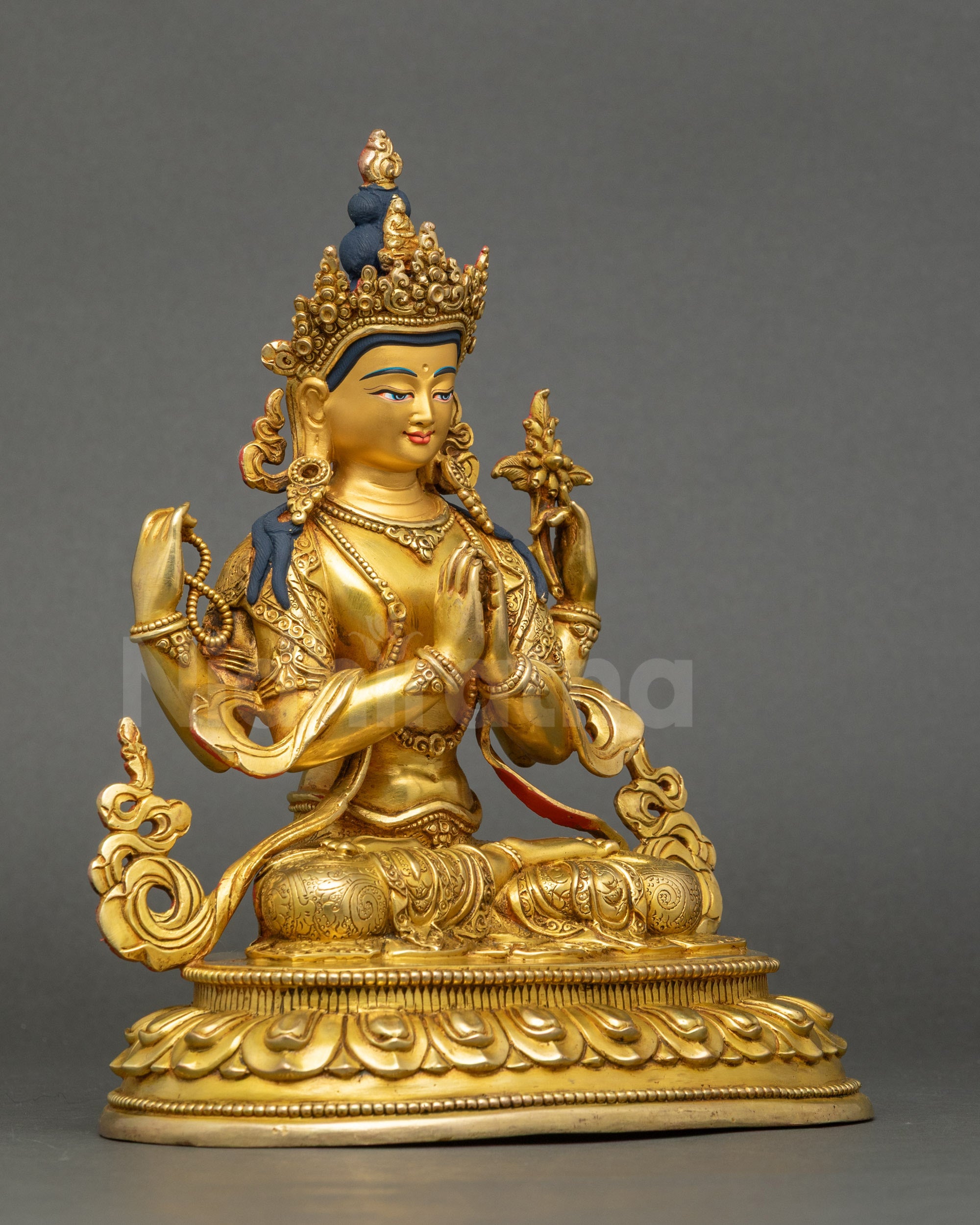 Right profile of Chenrezig Bodhisattva, copper sculpture with intricate carvings