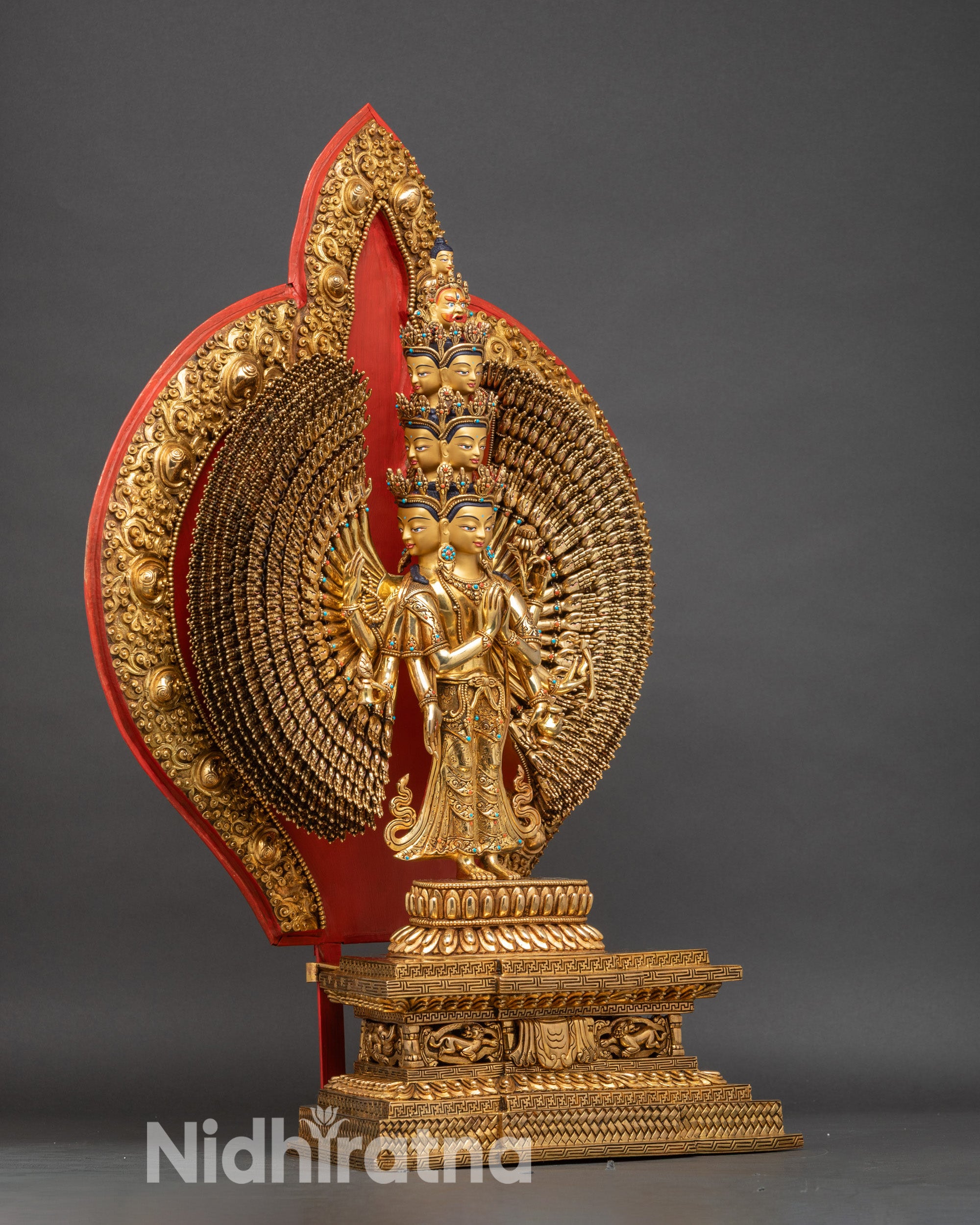 Right profile of Thousand-Armed Chenrezig statue, copper and gold Bodhisattva sculpture with lotus base and decorative halo