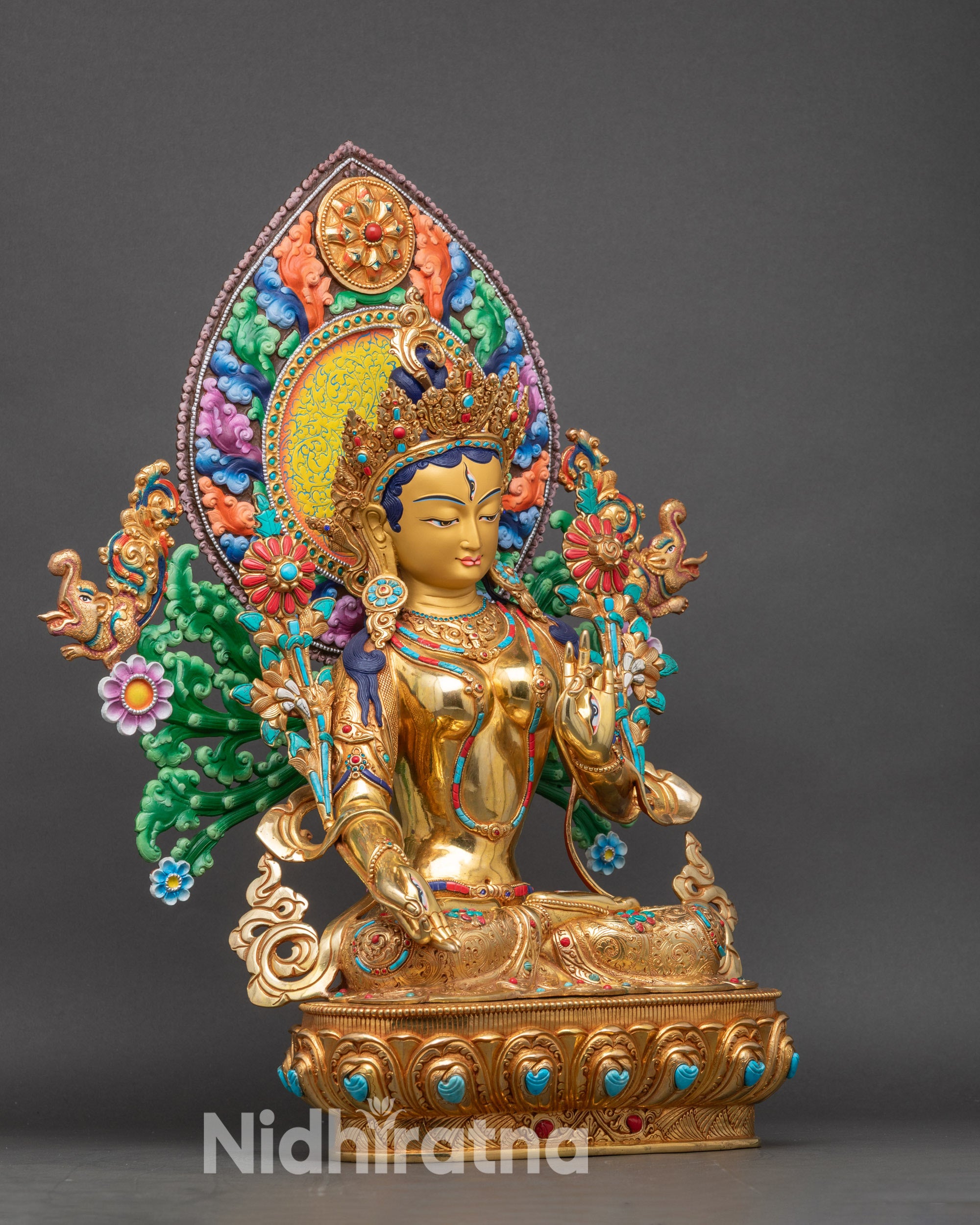 Right profile of White Tara sculpture, copper alloy with radiant gold fire-gilding