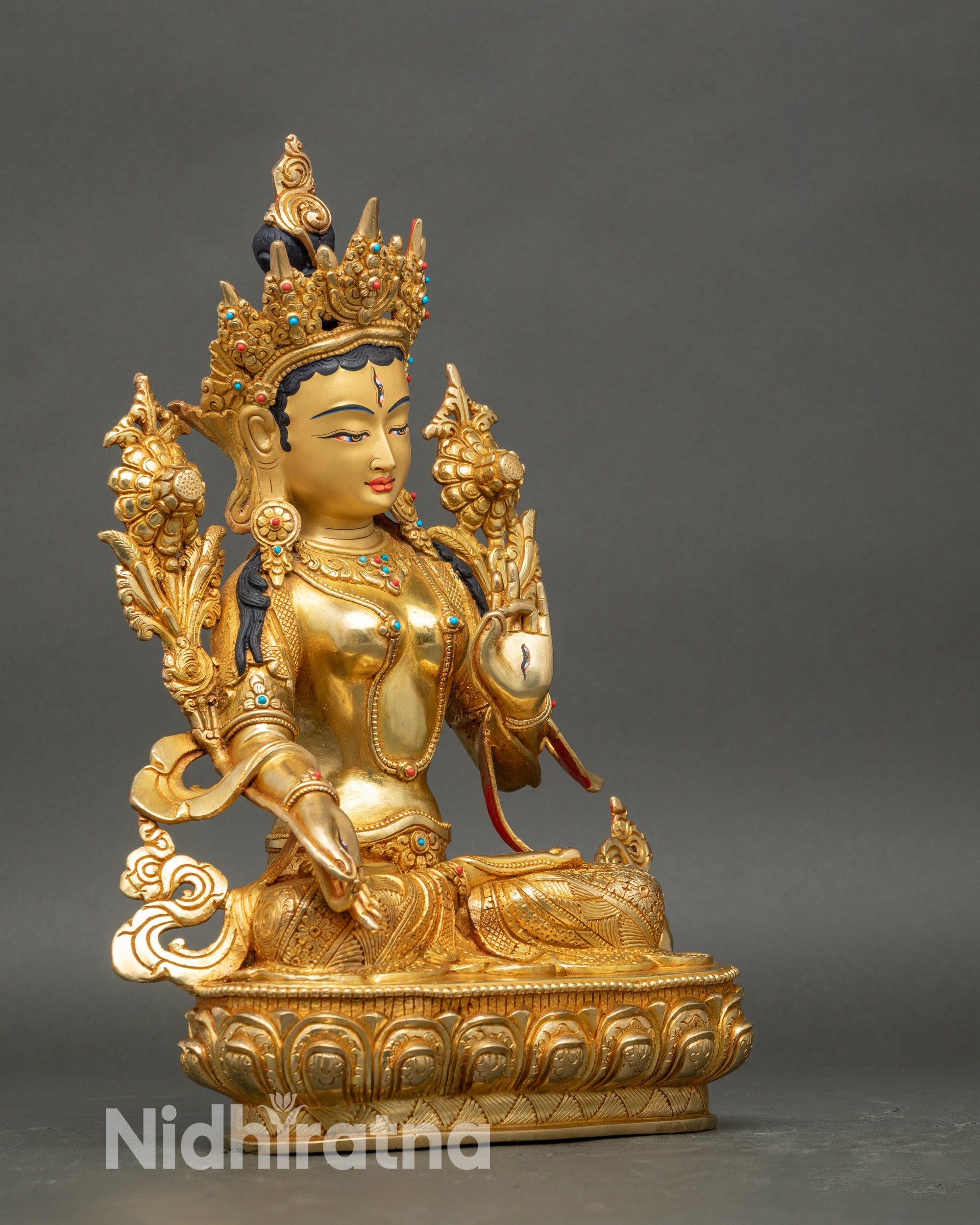 Right profile of White Tara statue, handcrafted Nepalese Buddhist art
