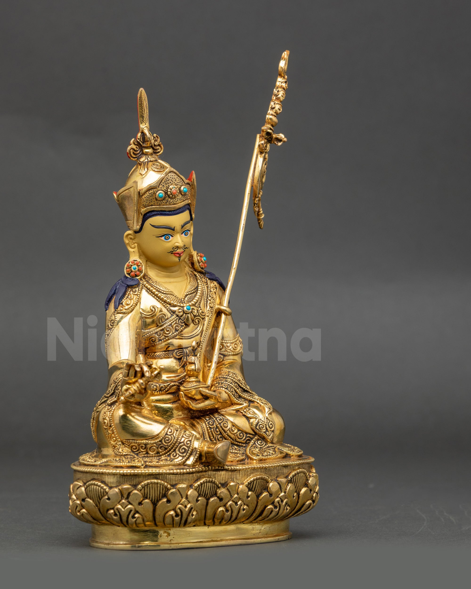 Right side Guru Rinpoche Vajrayana statue with Tripitaka robe and floral carvings