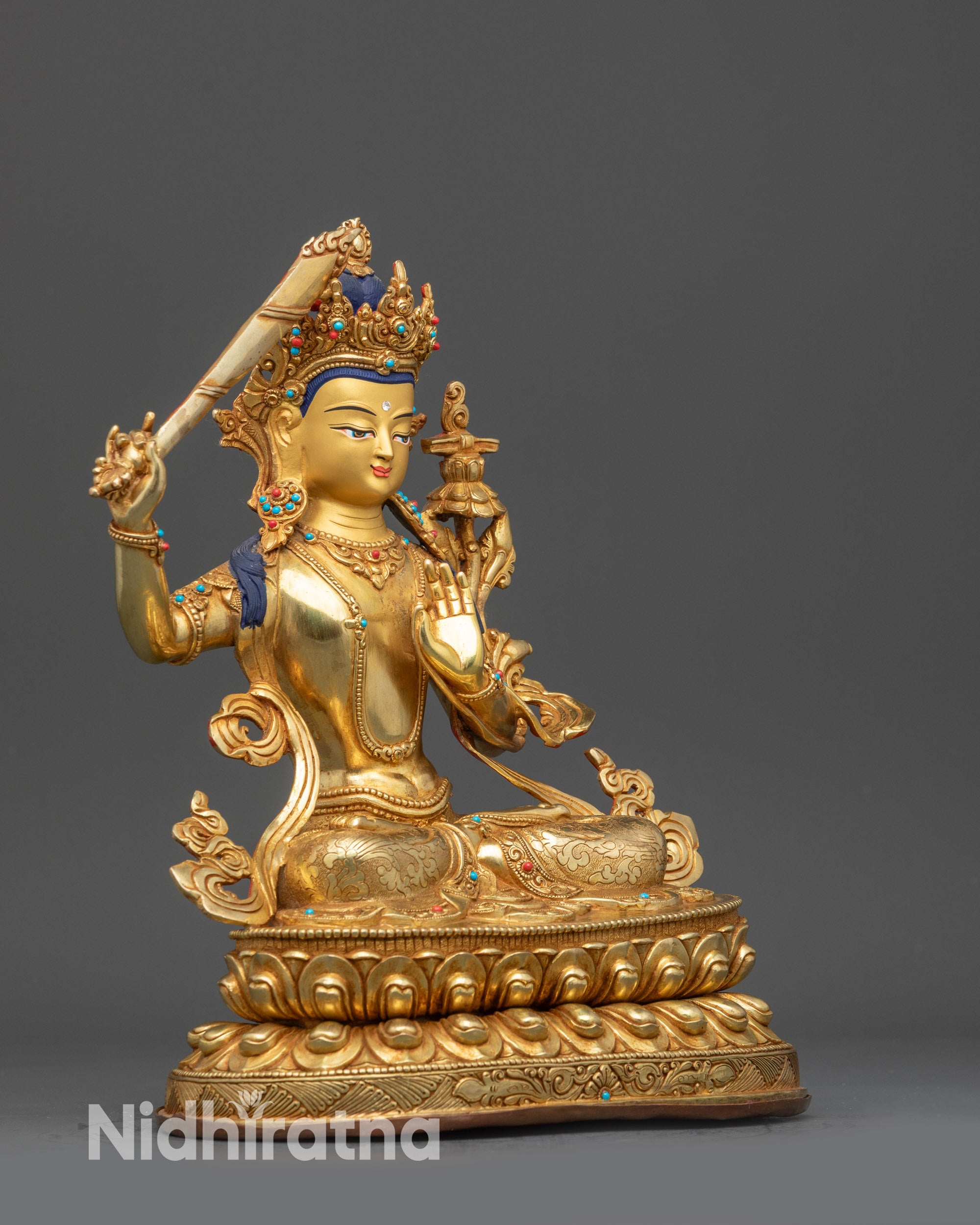 Right side view Prince of Wisdom Manjushree statue with carved robe patterns and lotus seat