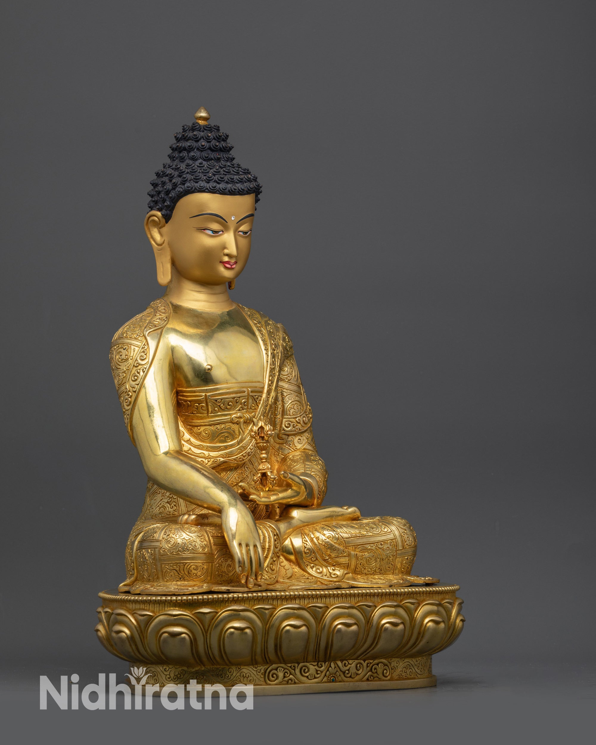 Right side view of Buddha Mitrugpa statue holding Vajra in earth-touching mudra pose