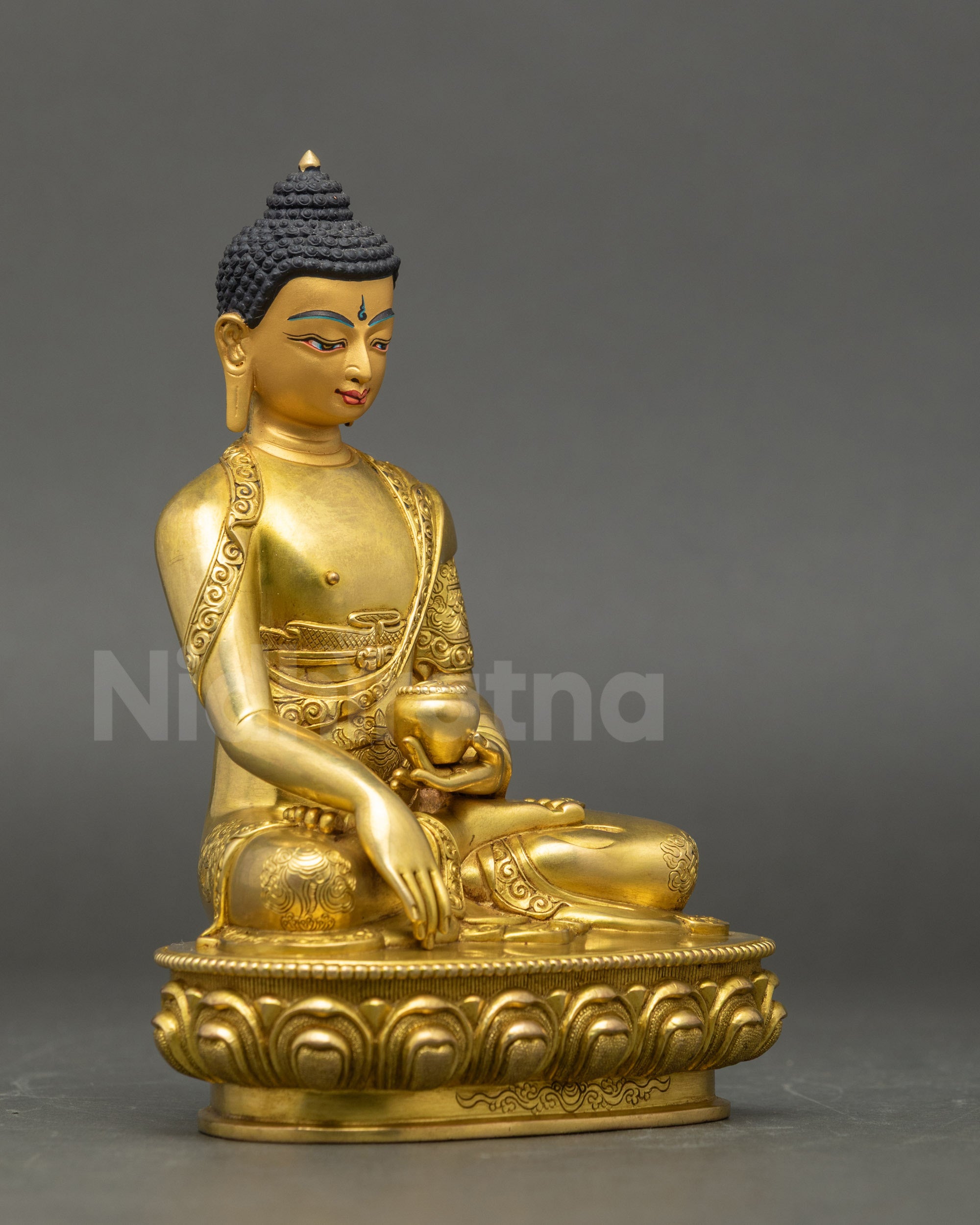 Right side view of Buddha Shakyamuni Statue showing detailed robes and spiritual presence