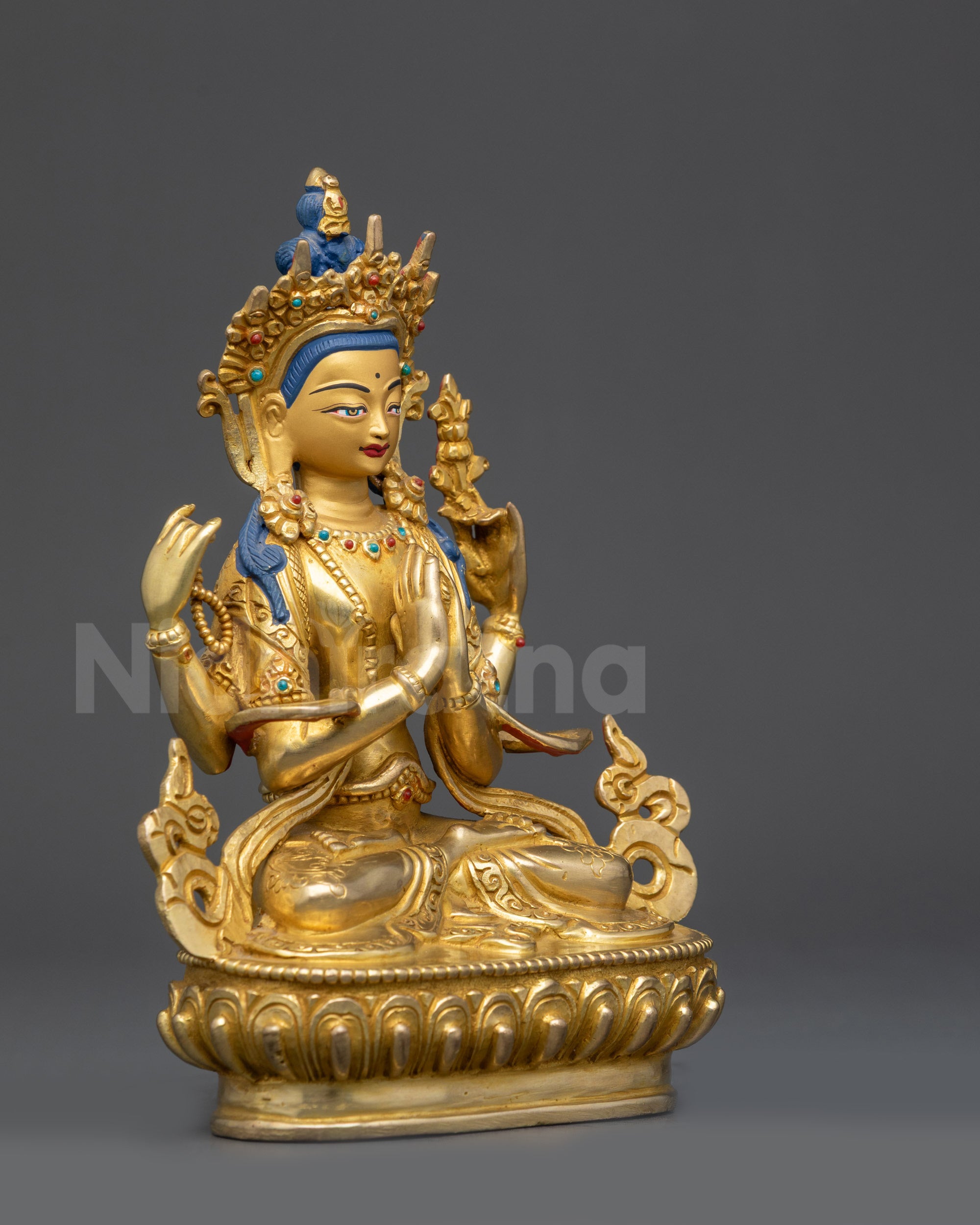 Right side view of Chenrezig Statue on lotus seat with gold-gilded base and armlets