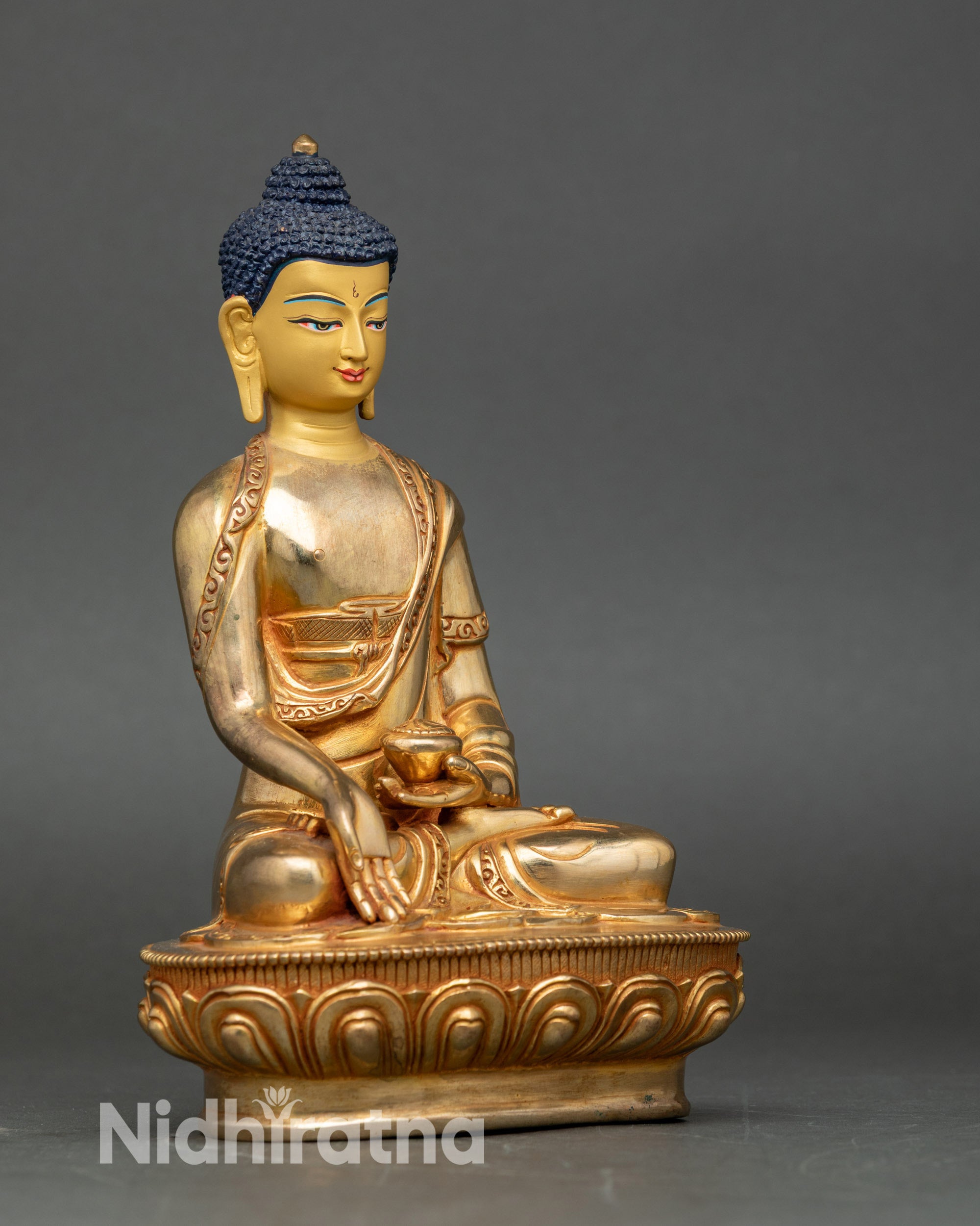 Right side view of Ratnasambhava statue on lotus seat, handcrafted Nepalese artwork